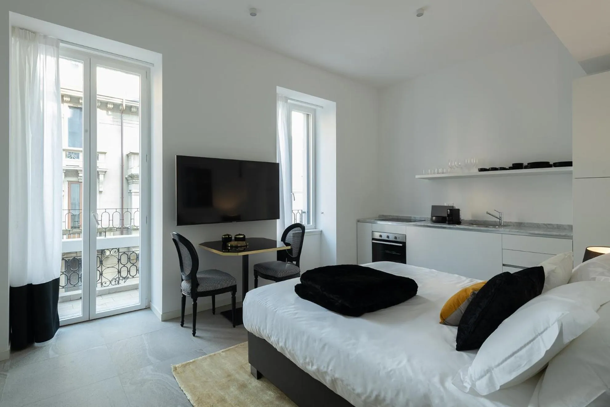 Bed in JOIVY Boutique Apartments Farneti