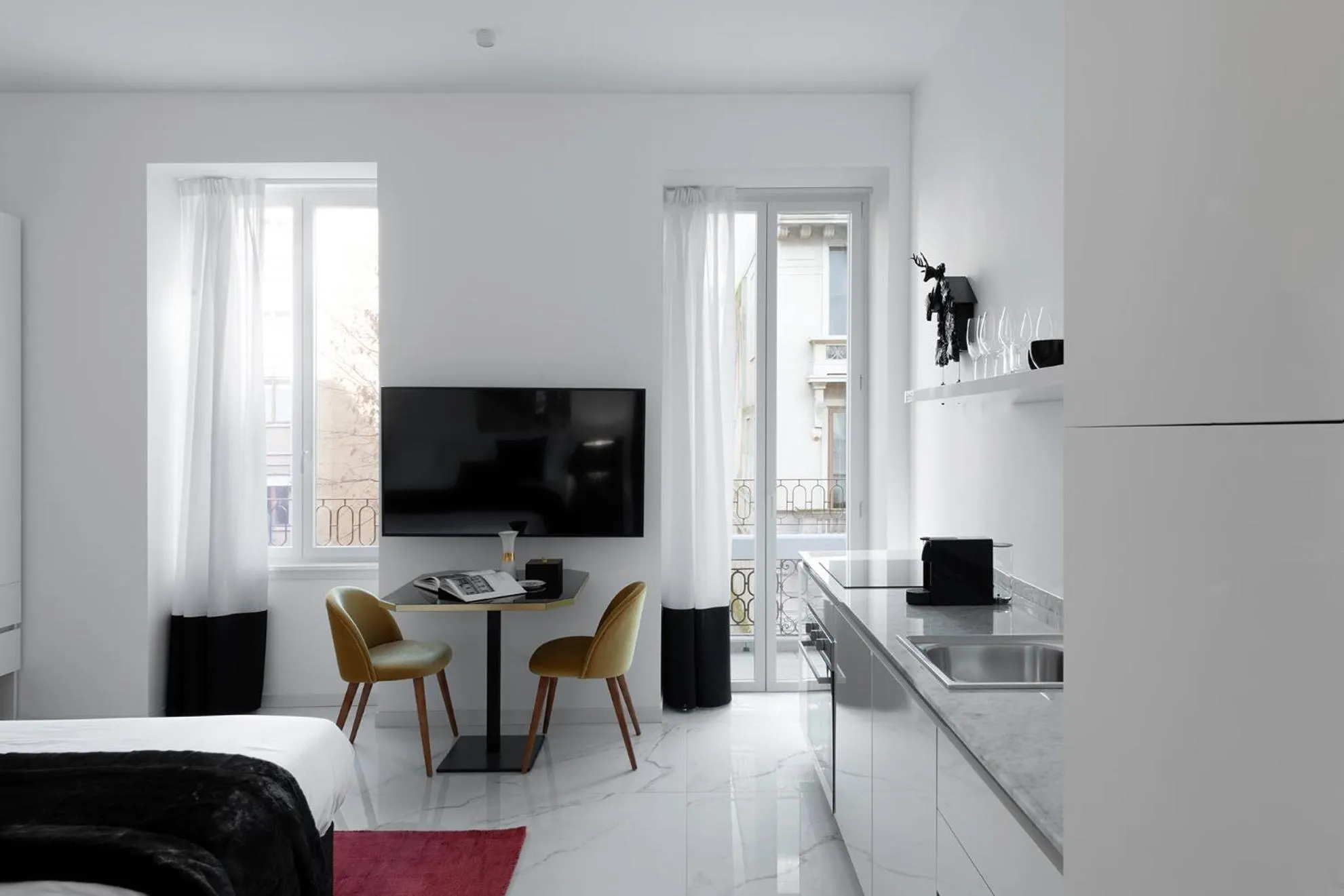 TV and multimedia in JOIVY Boutique Apartments Farneti