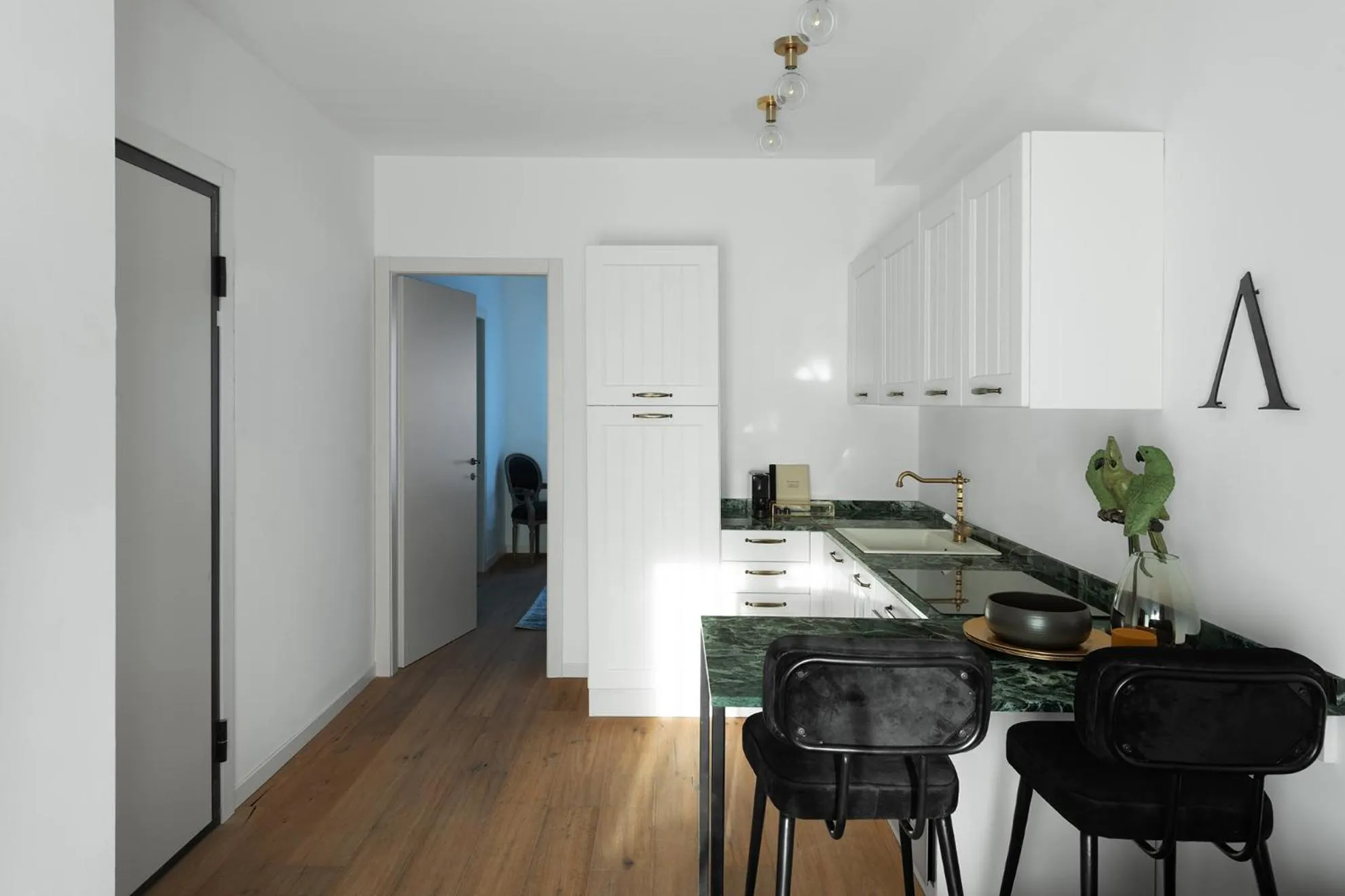 Kitchen or kitchenette in JOIVY Boutique Apartments Farneti