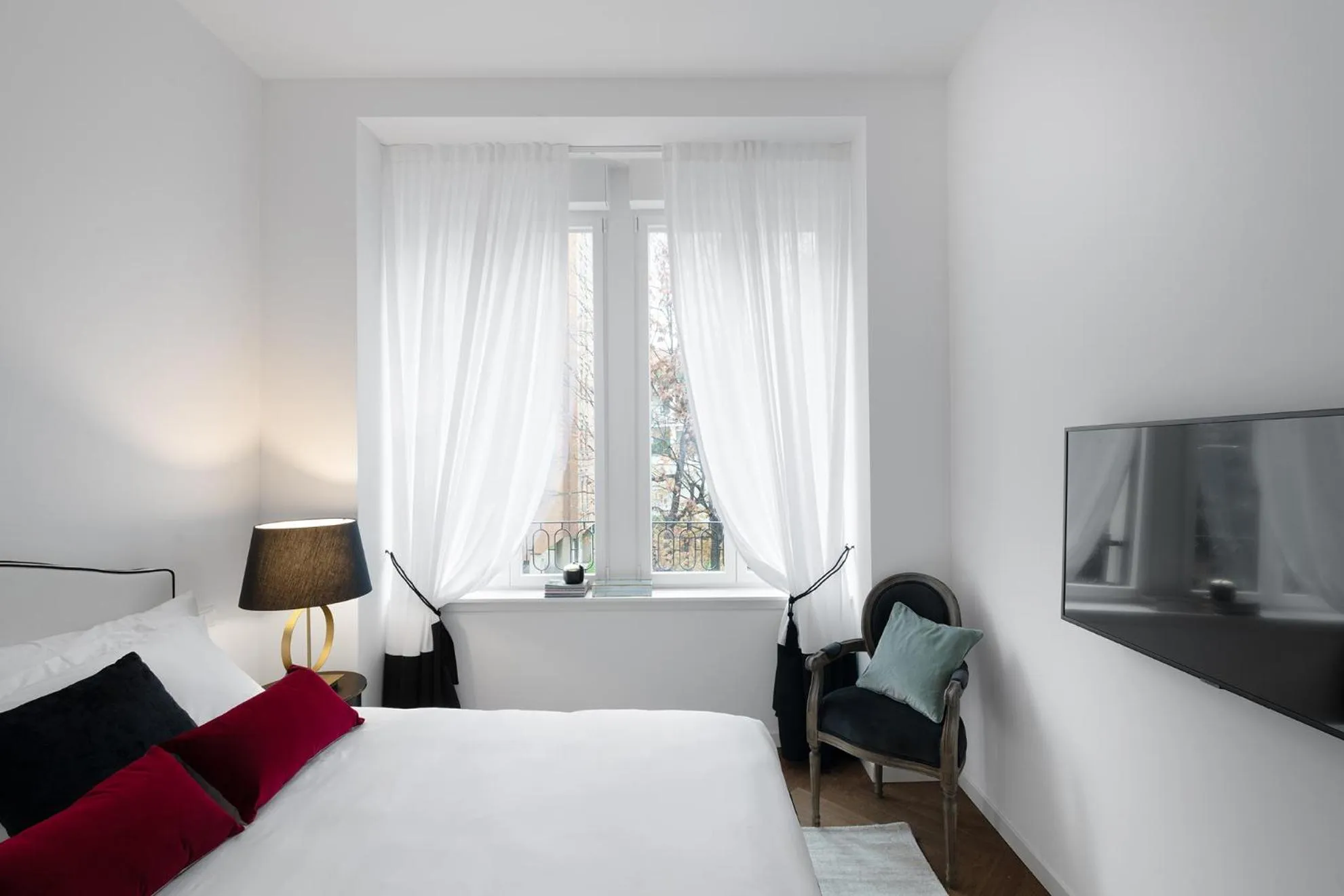 Bed in JOIVY Boutique Apartments Farneti