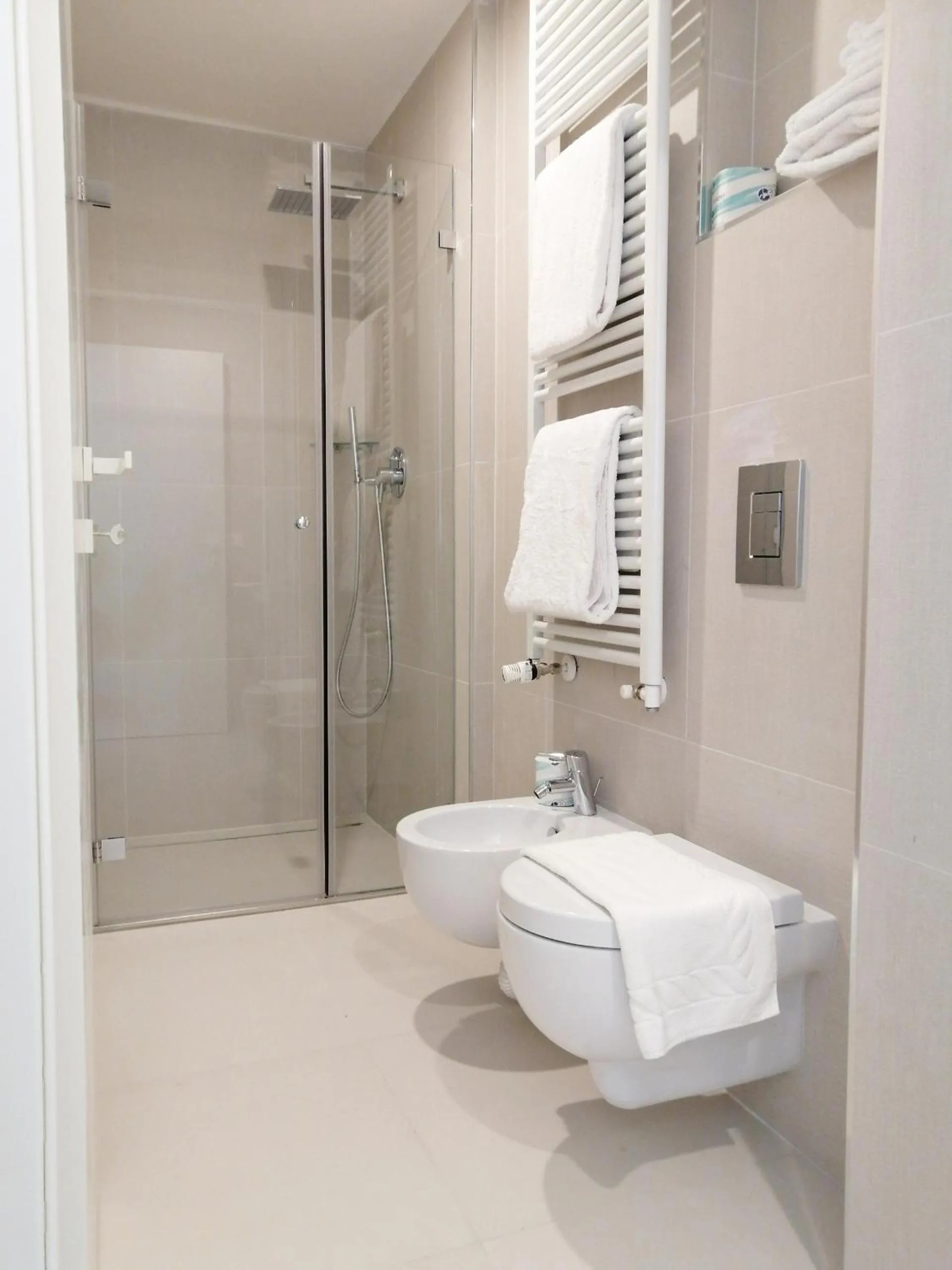 Shower in JOIVY Boutique Apartments Farneti
