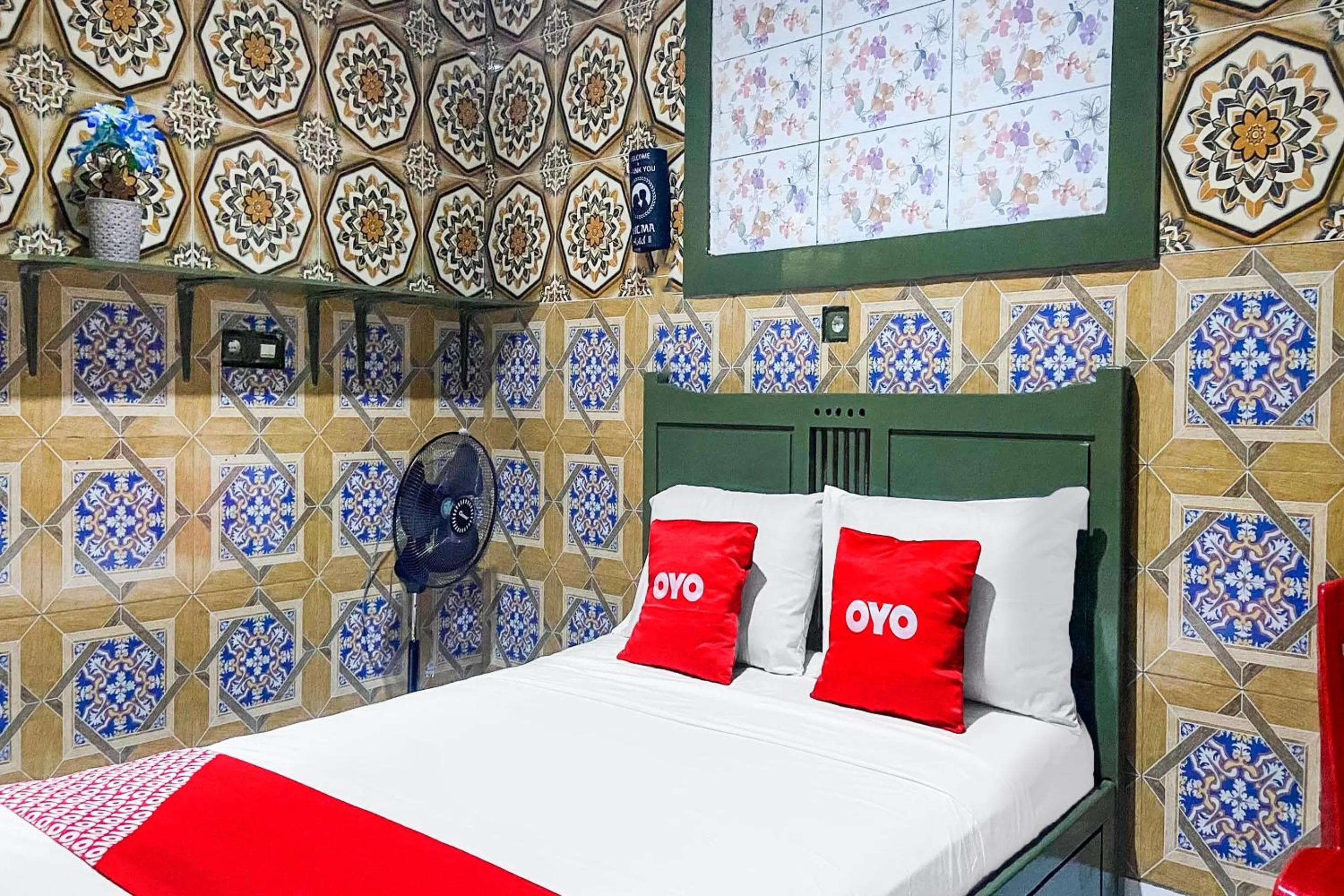 Bedroom in OYO 2518 Wilma Hotel Ii Premier