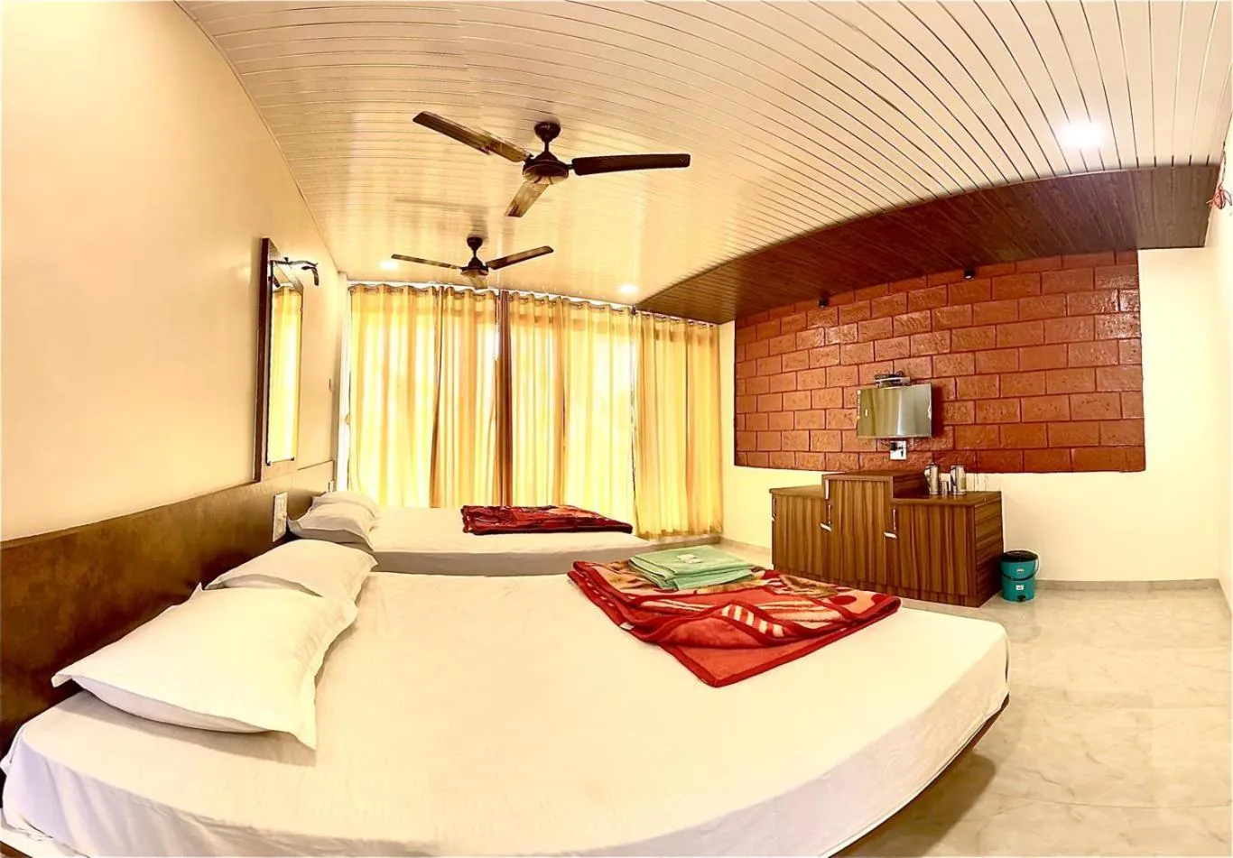 Bed in Shivshrushti Agro Tourism & River Camp Tapola