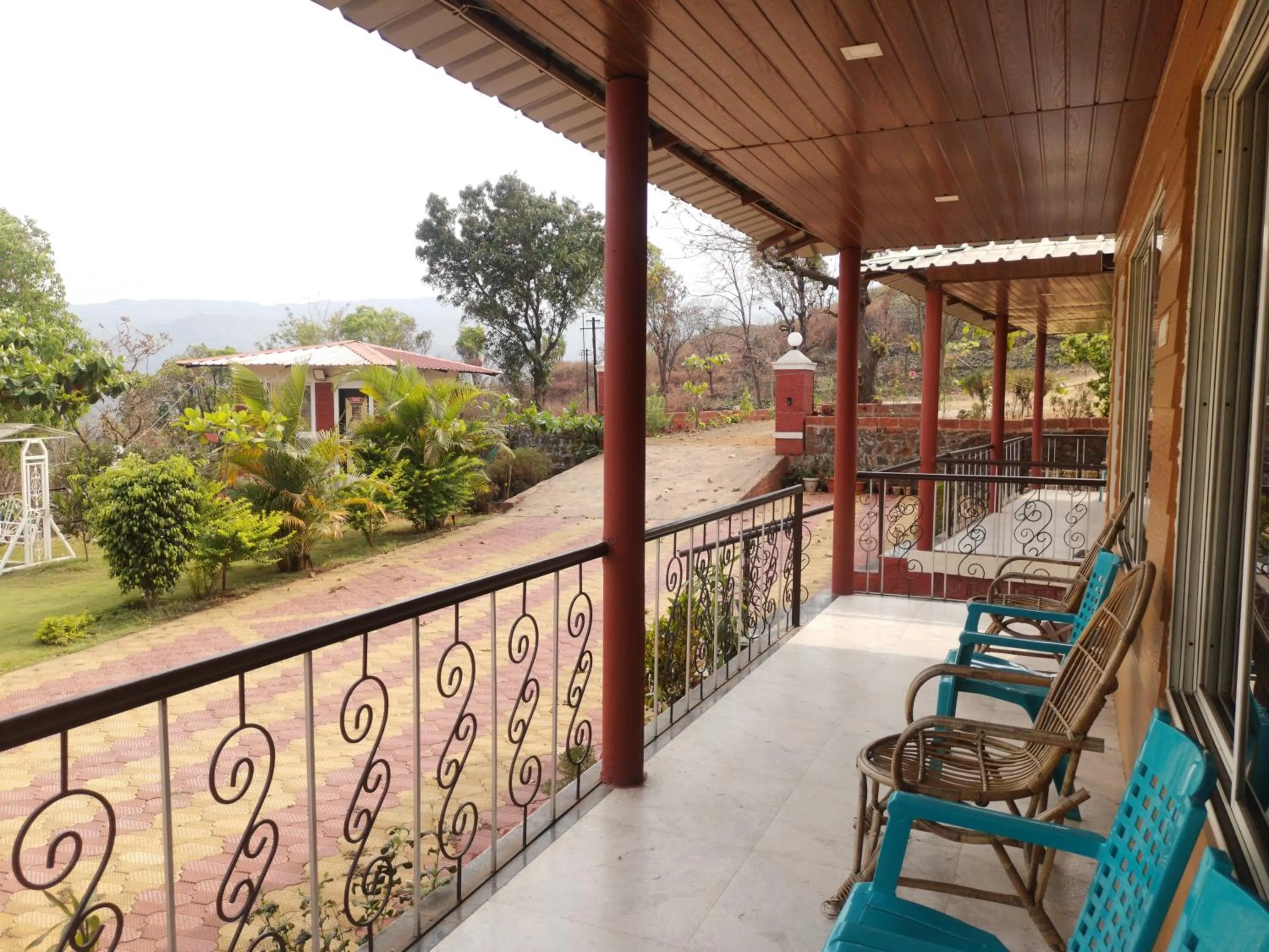 Balcony/Terrace in Shivshrushti Agro Tourism & River Camp Tapola