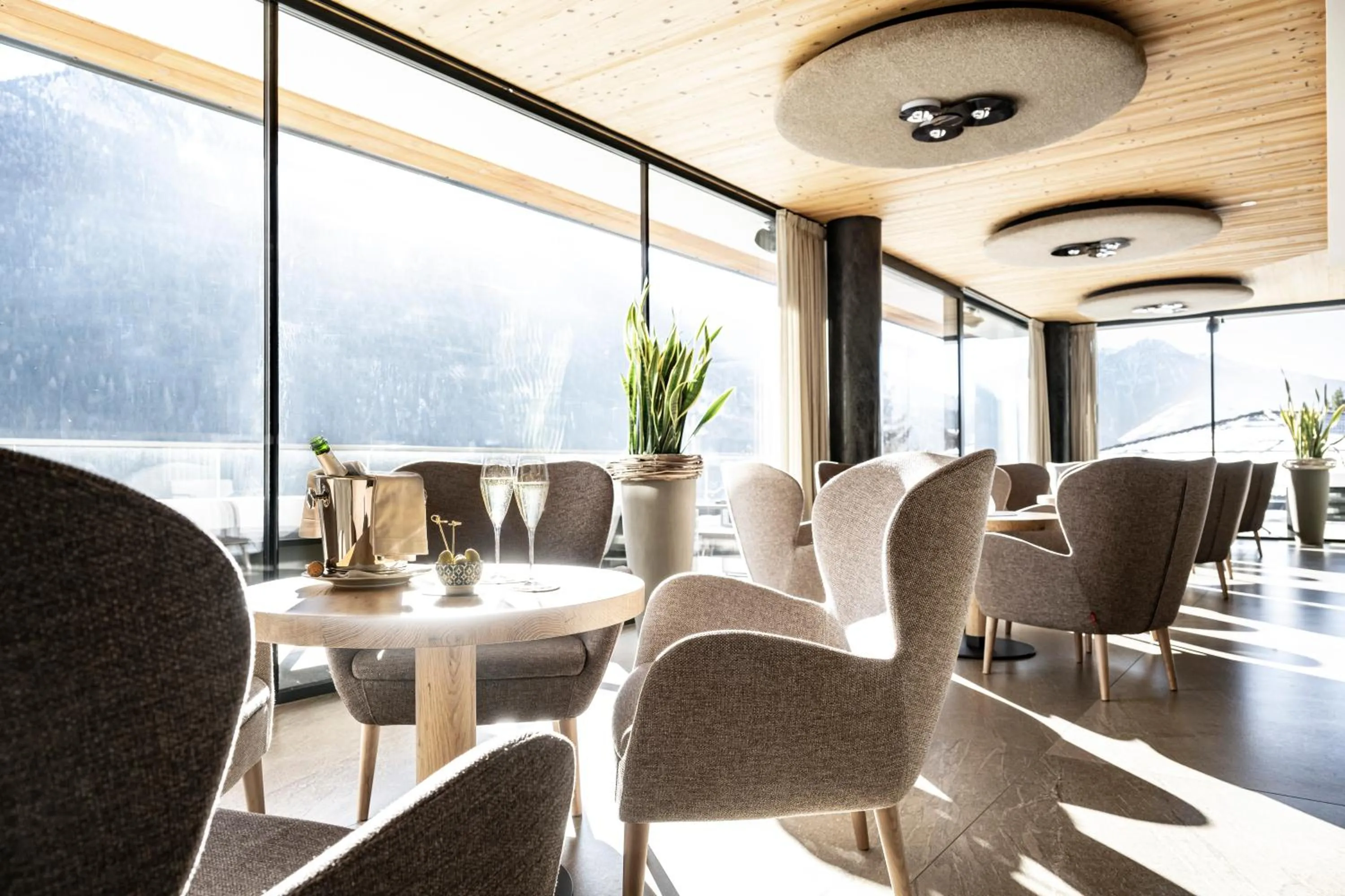 Lounge or bar in Ciampedie Luxury Alpine Spa Hotel