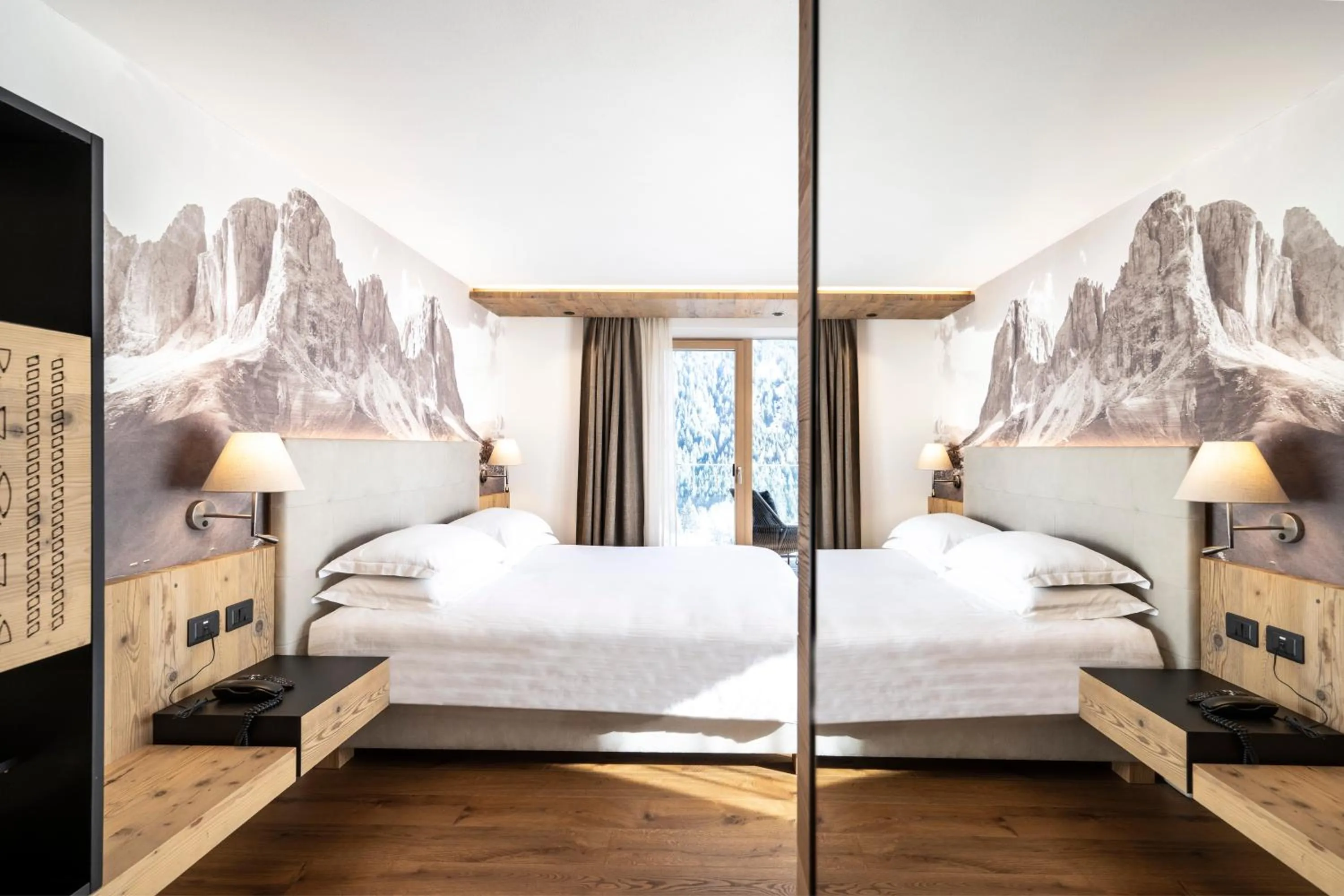 Bed in Ciampedie Luxury Alpine Spa Hotel