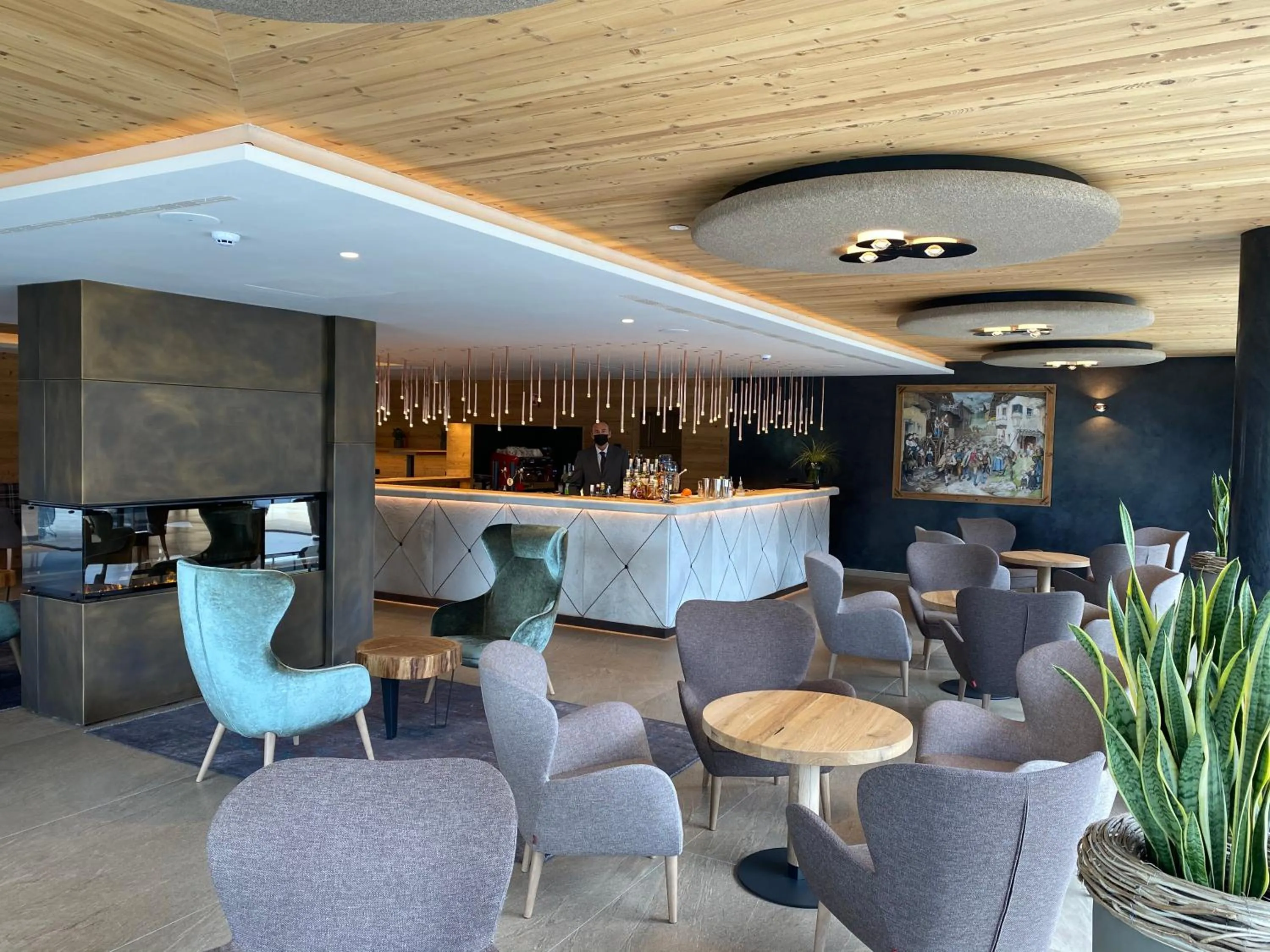 Lounge or bar in Ciampedie Luxury Alpine Spa Hotel