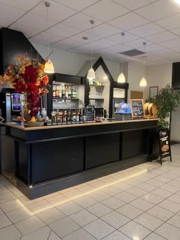 Lounge or bar in The Originals City, Hôtel du Faucigny, Cluses Ouest