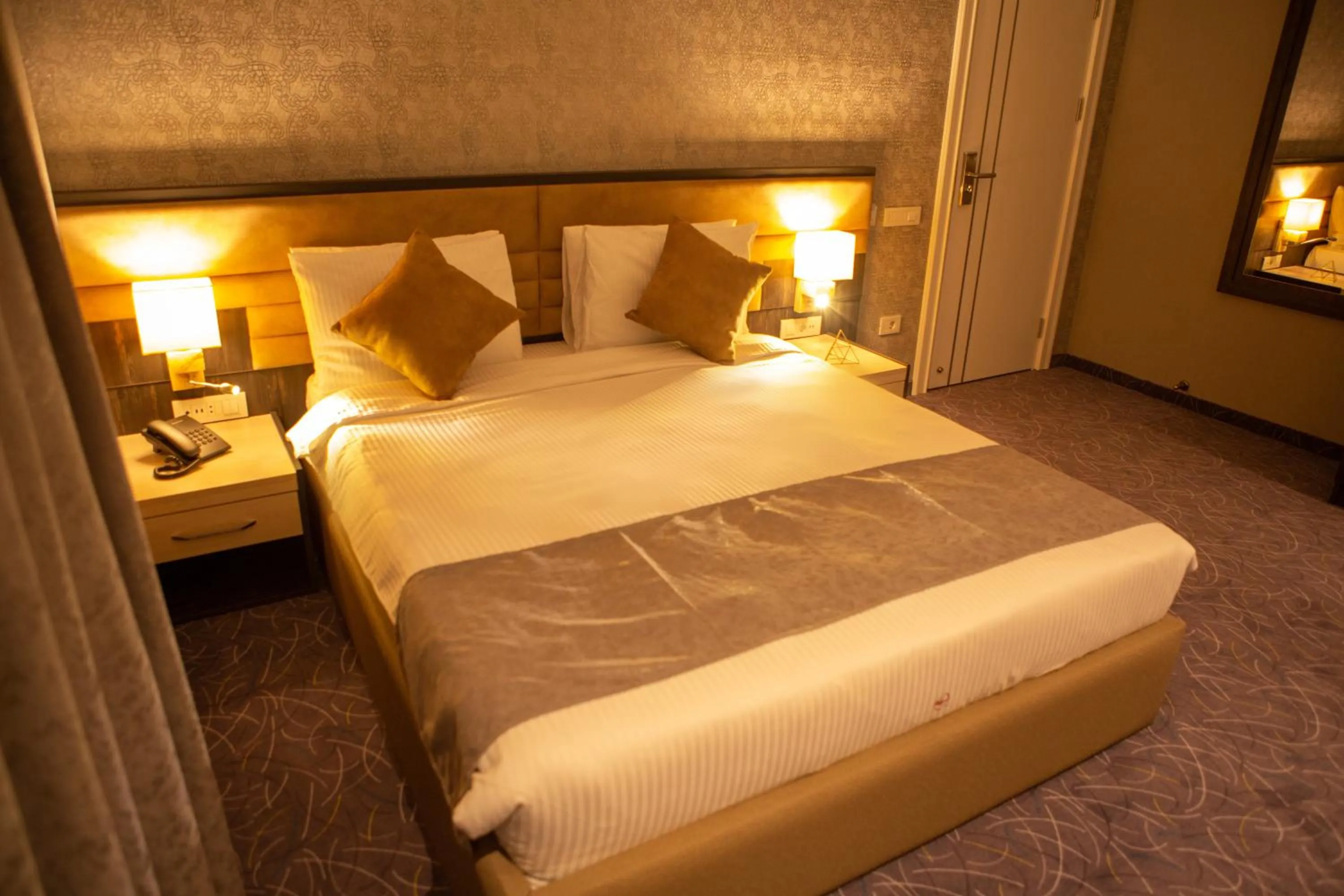 Bed in Parkway Inn Hotel & Spa