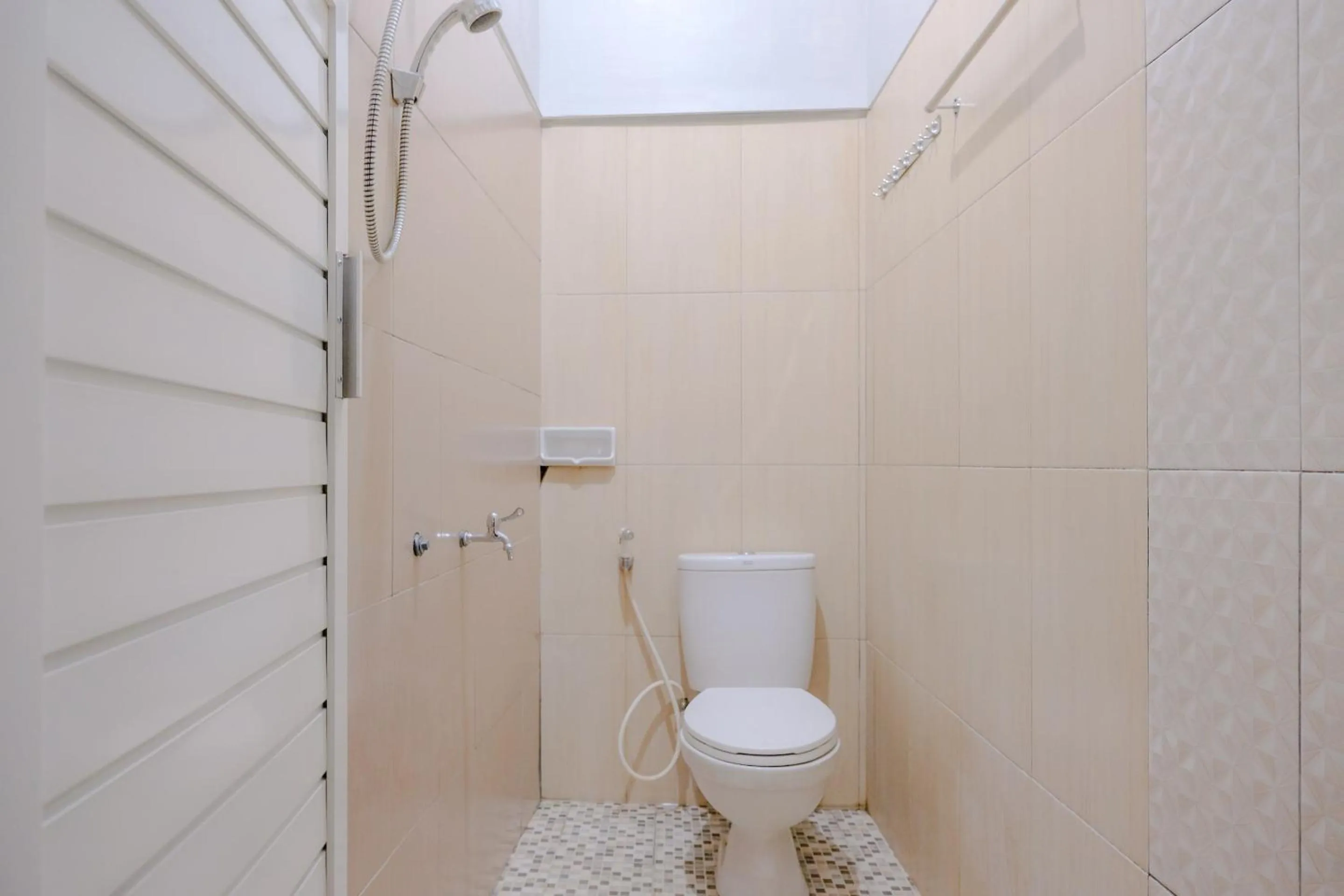 Bathroom in OYO 2376 Tiara Family Residence