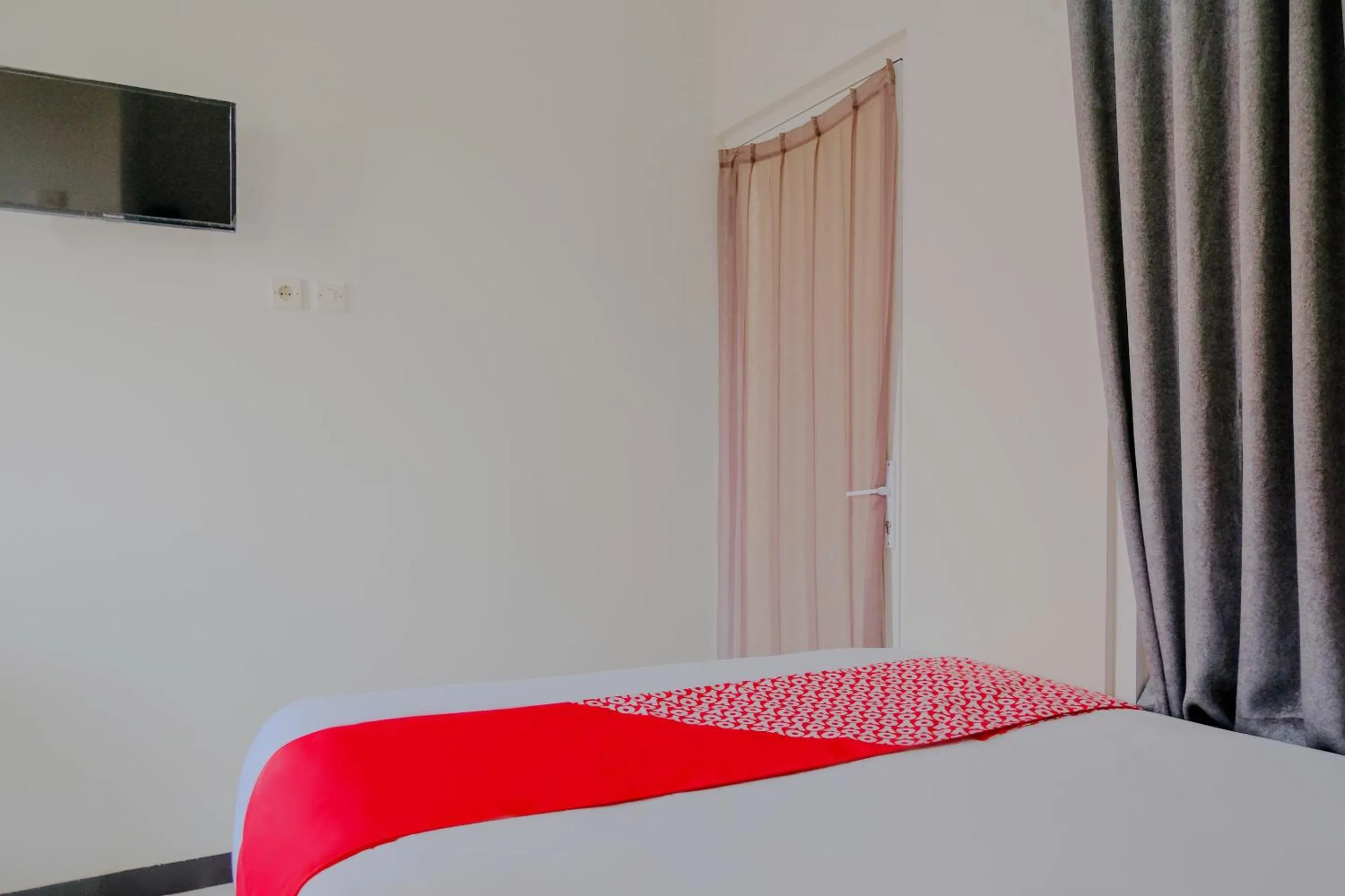 Bedroom in OYO 2376 Tiara Family Residence