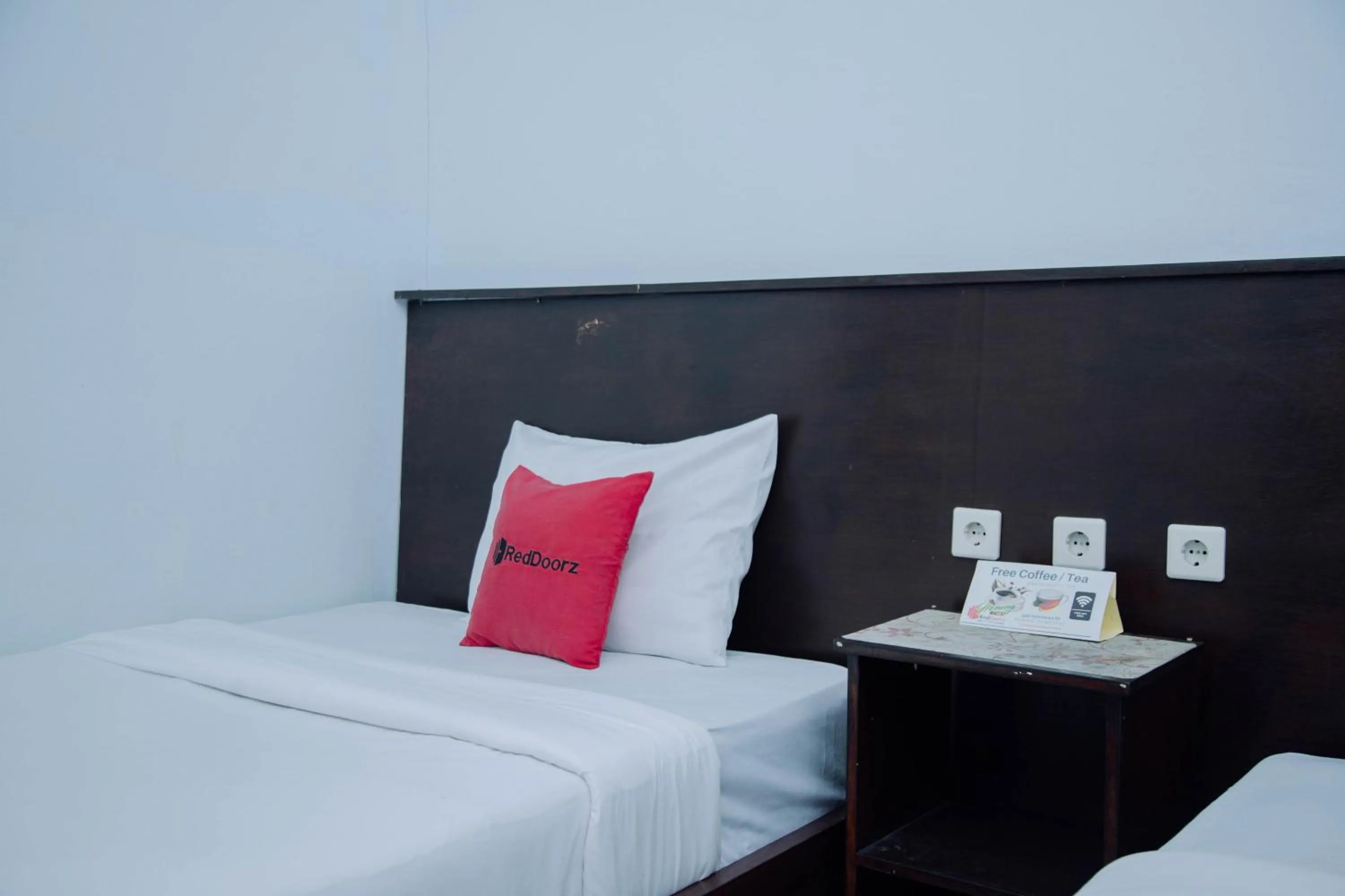 Bedroom, Bed in RedDoorz at Hening Homestay