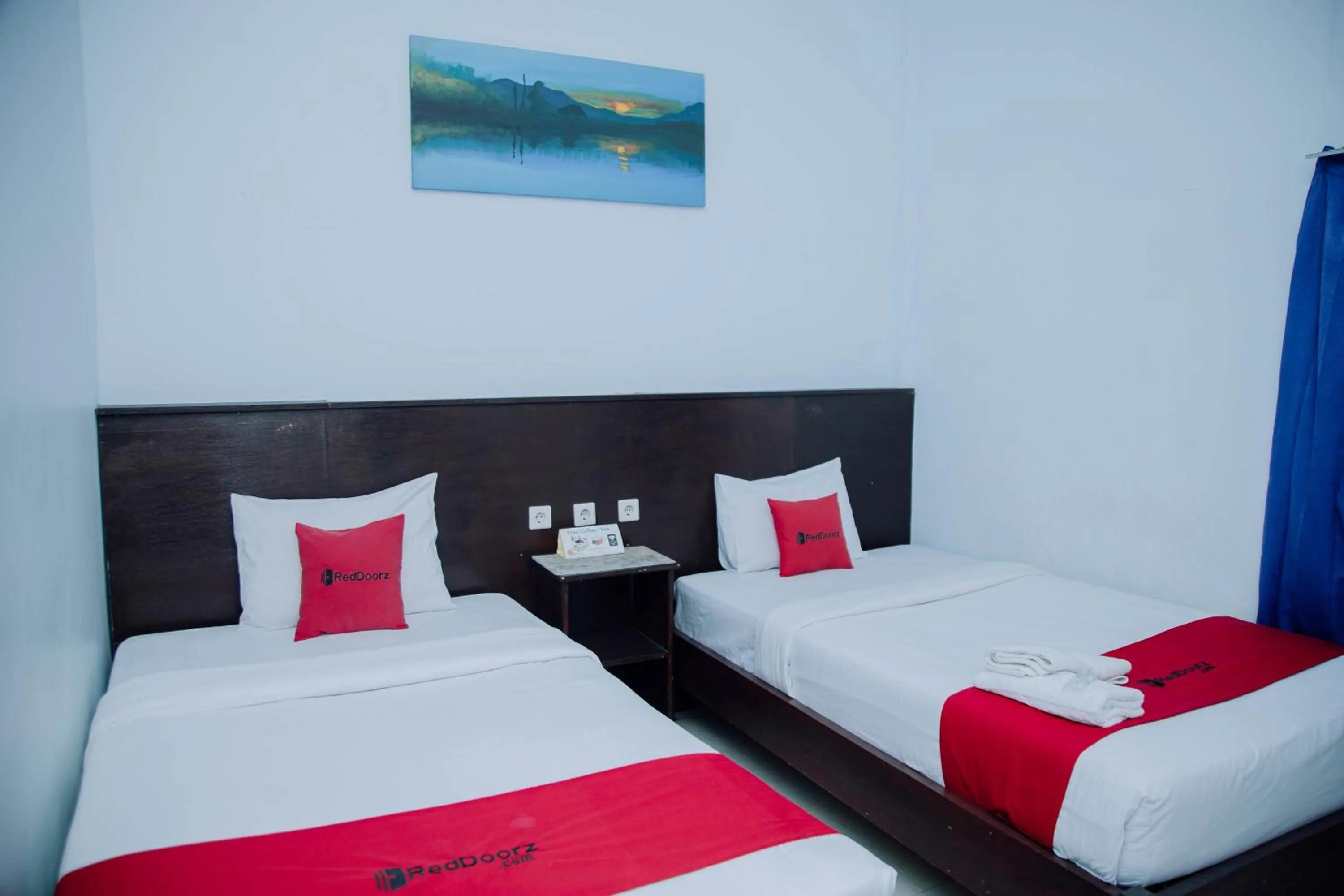 Bedroom, Bed in RedDoorz at Hening Homestay