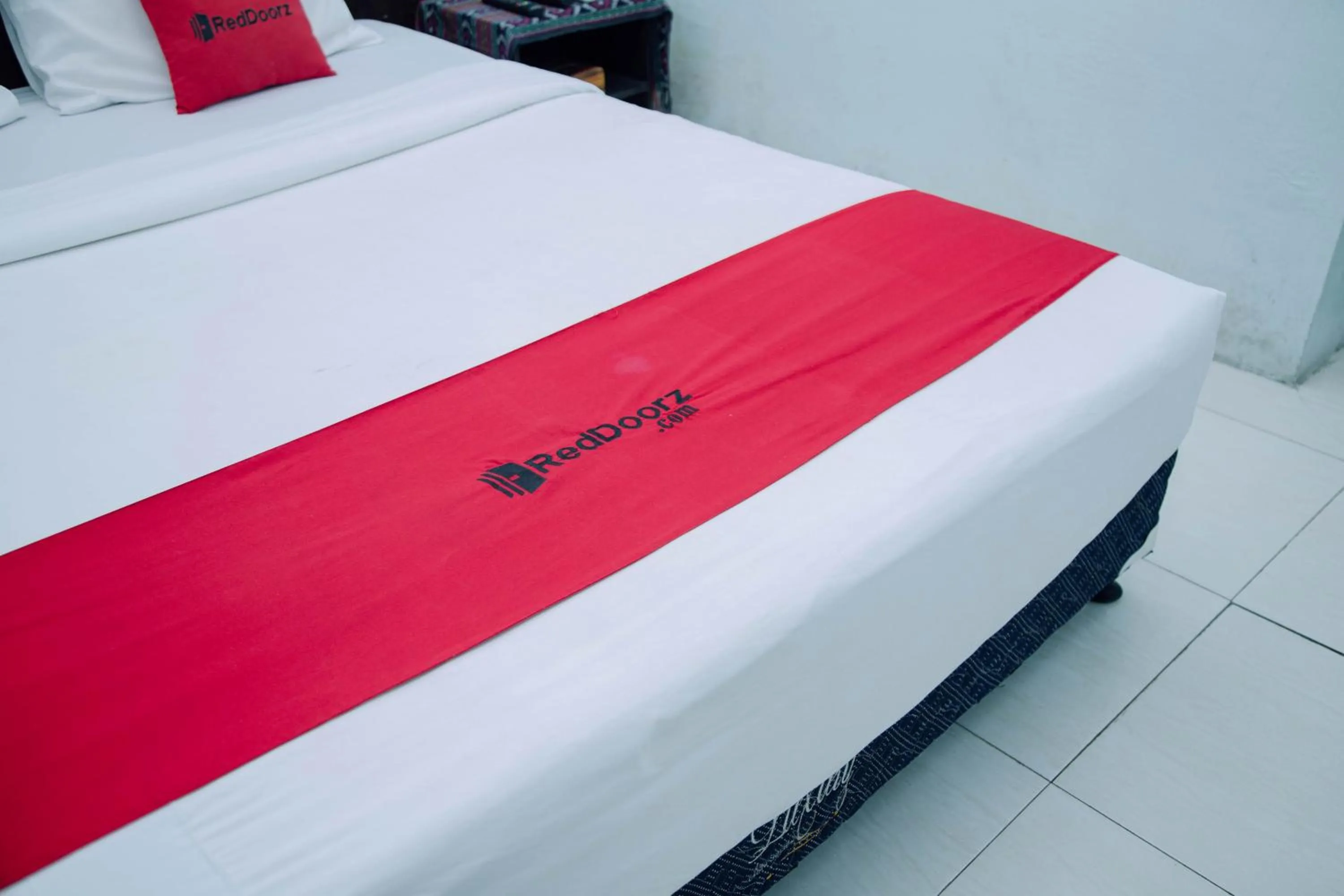 Bedroom, Bed in RedDoorz at Hening Homestay