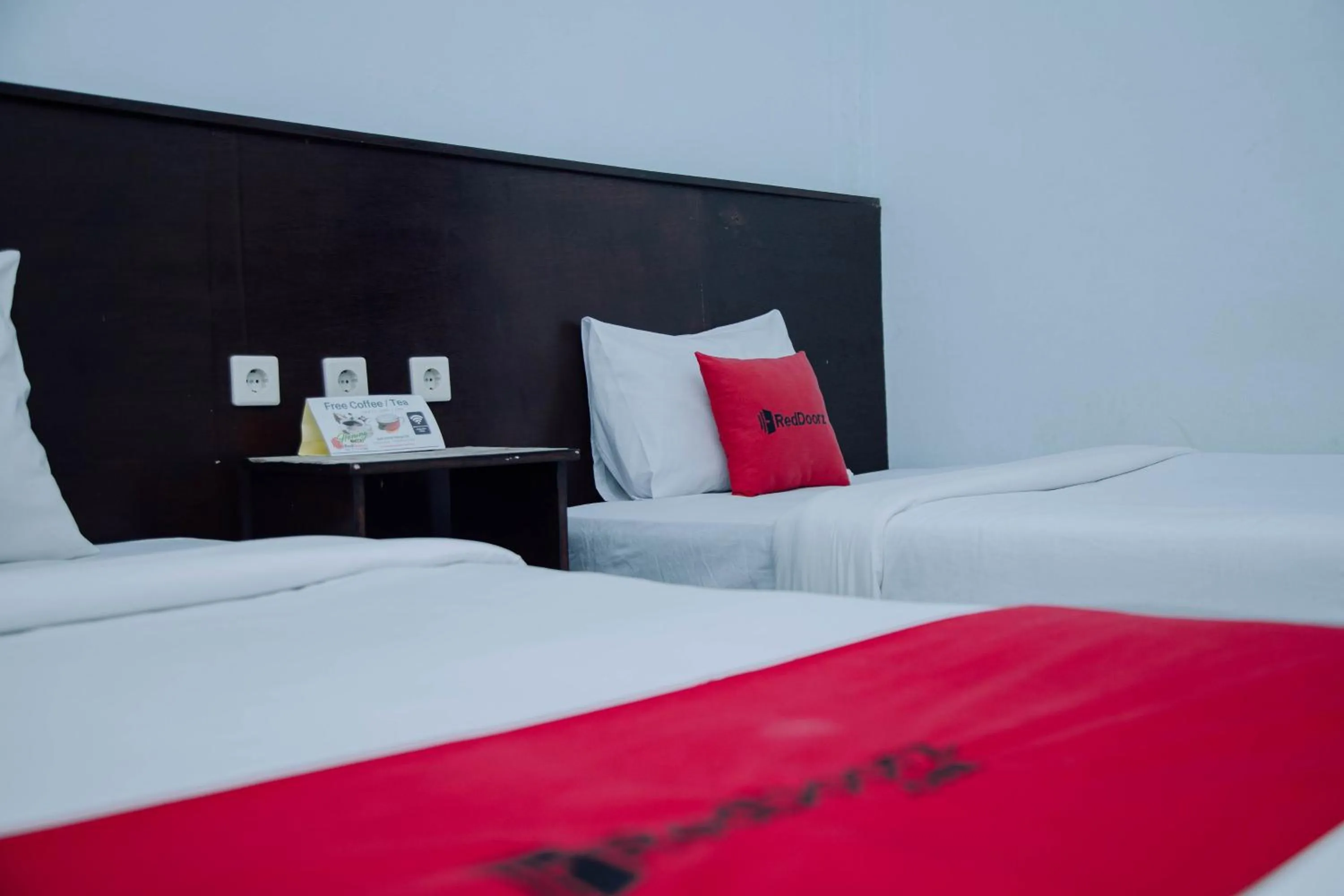 Bedroom, Bed in RedDoorz at Hening Homestay