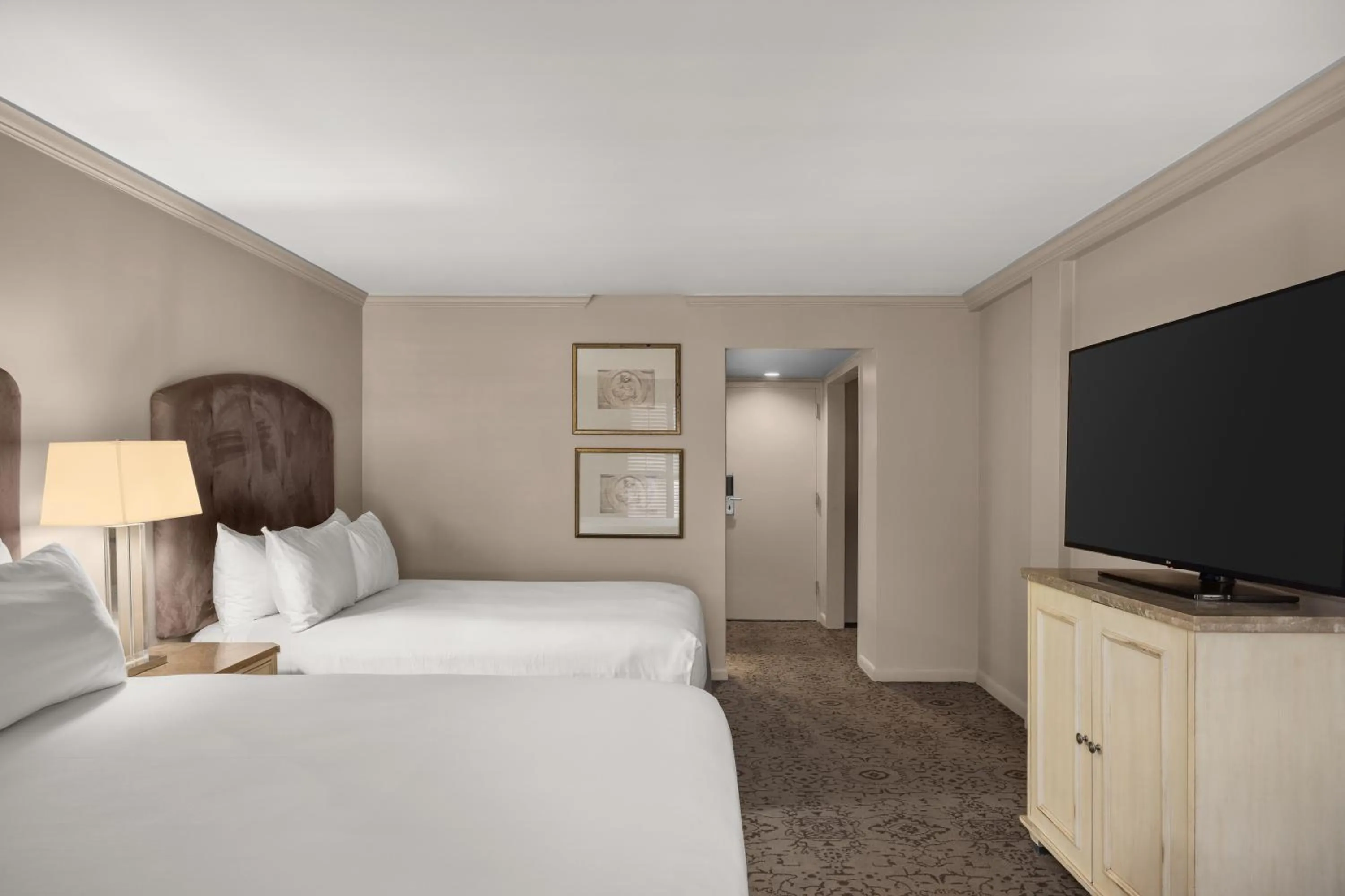 Bed in Dauphine Orleans Hotel