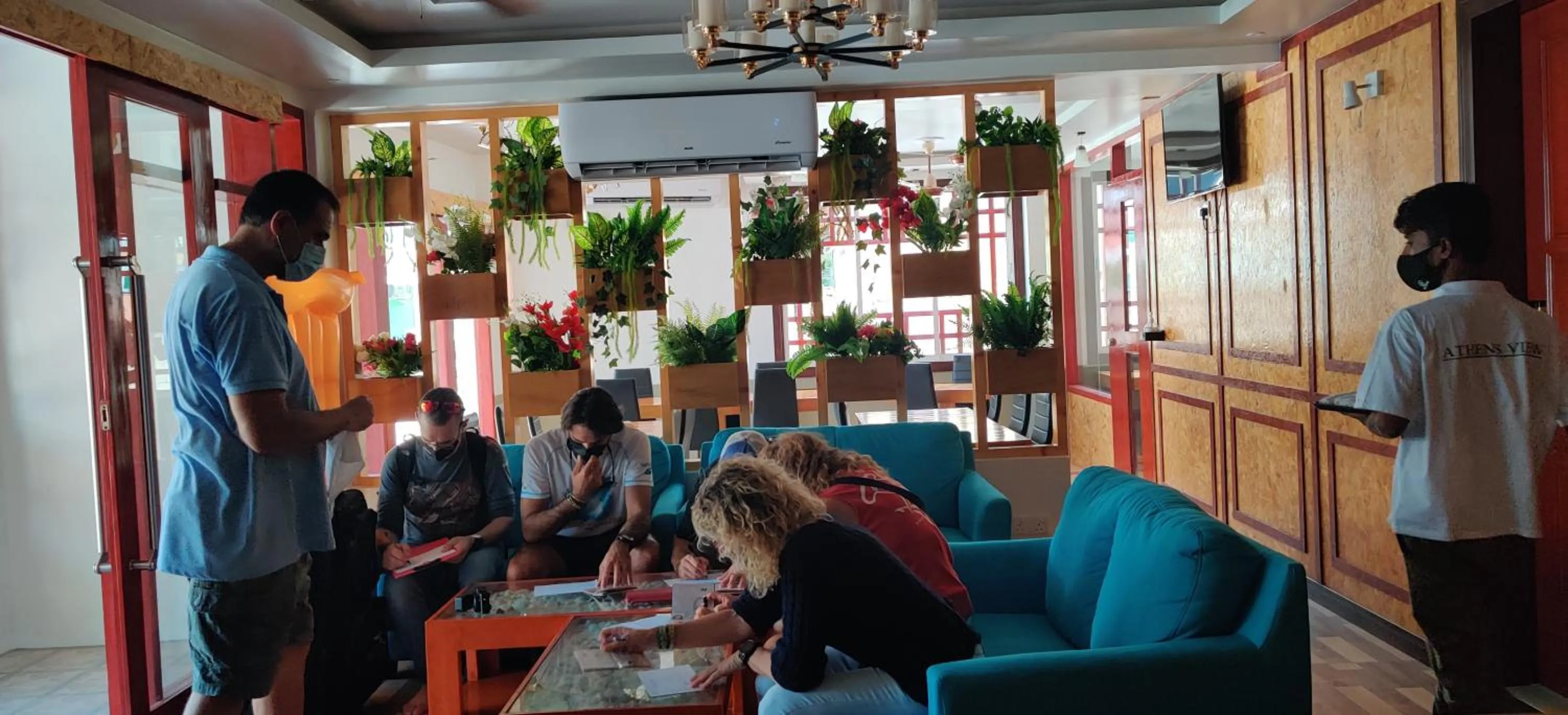 Communal lounge/ TV room in Athens View Hotel