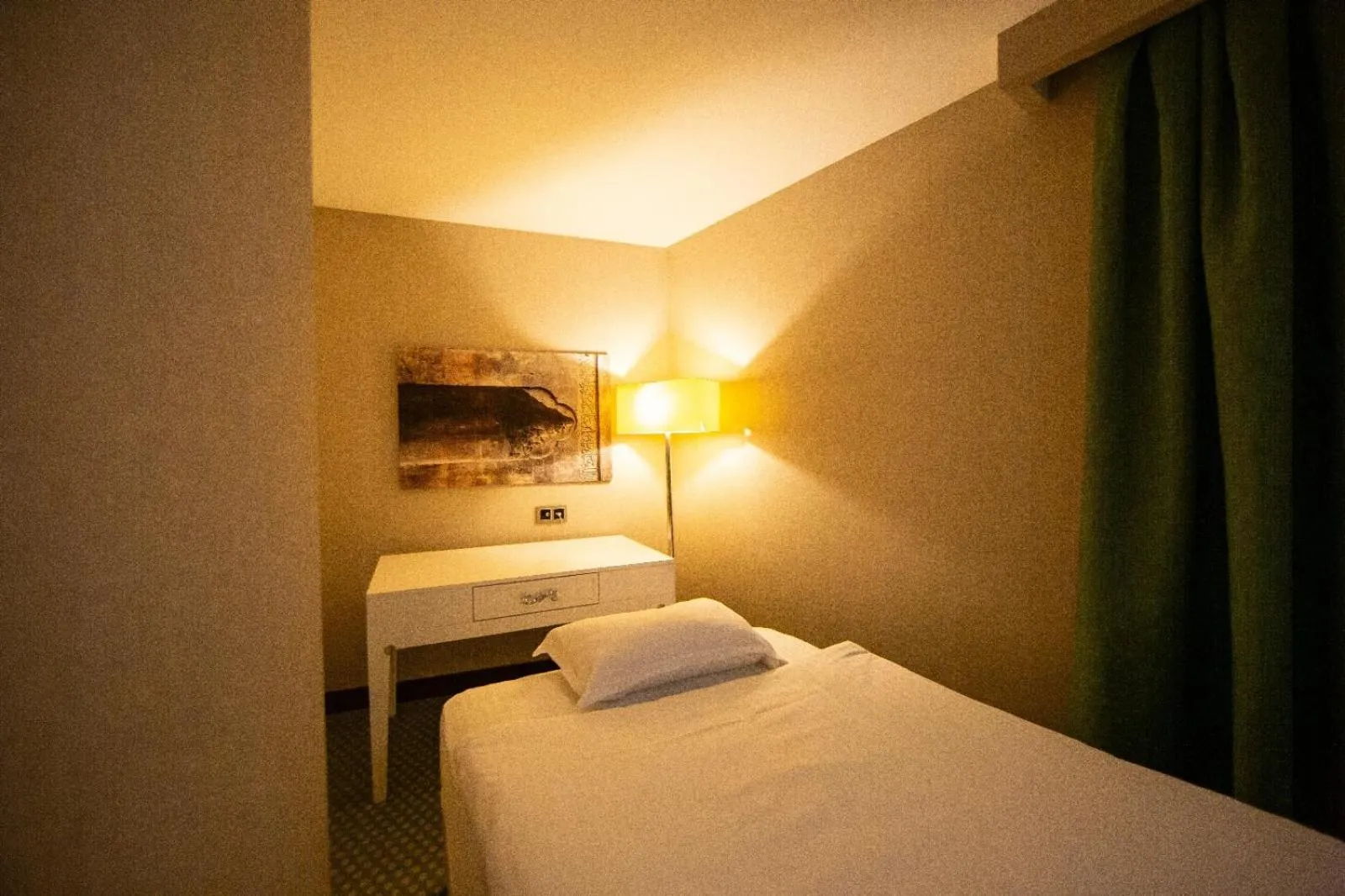 Bed in Nevali Hotel & Convention Center