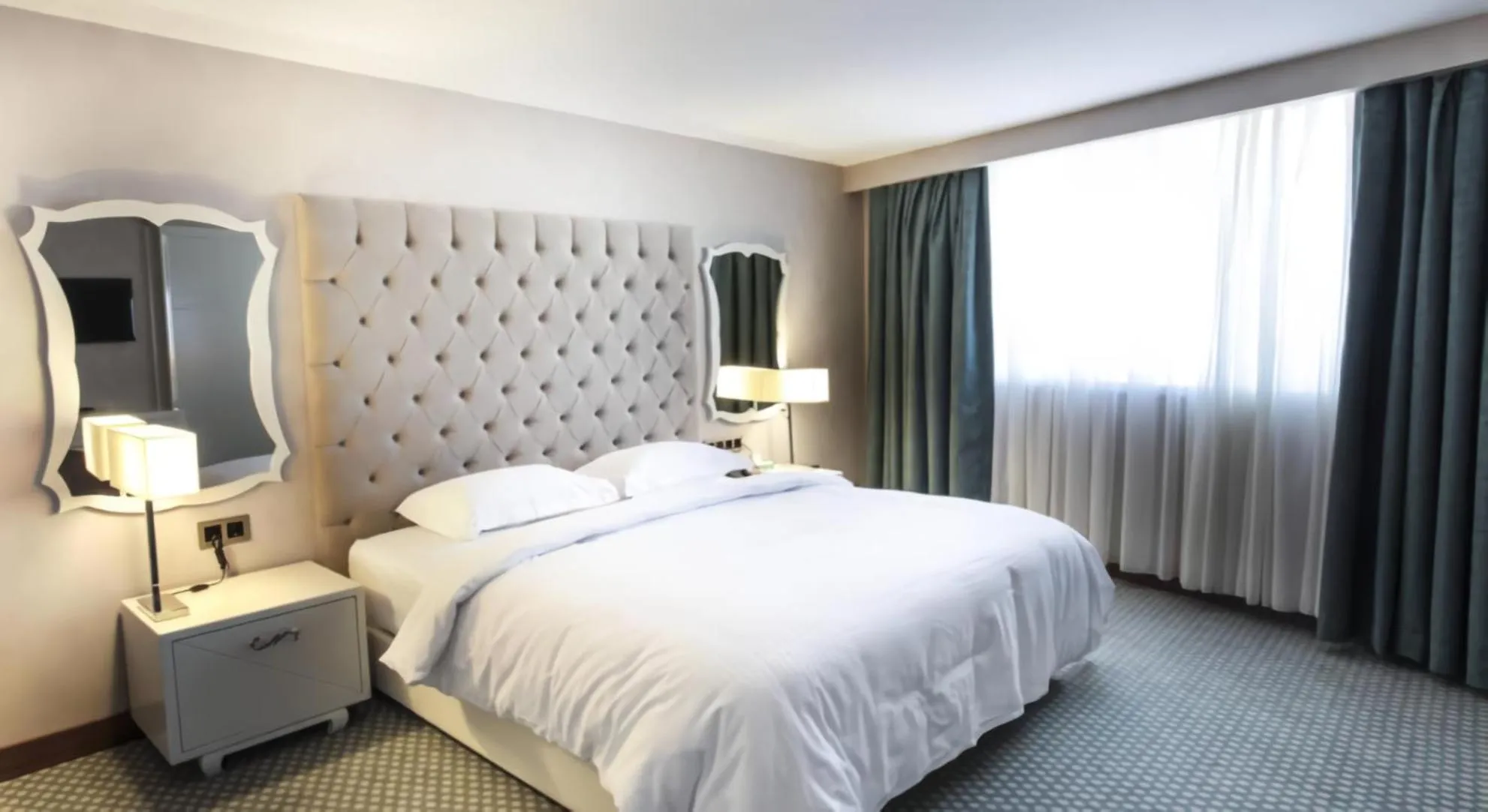 Bed in Nevali Hotel & Convention Center