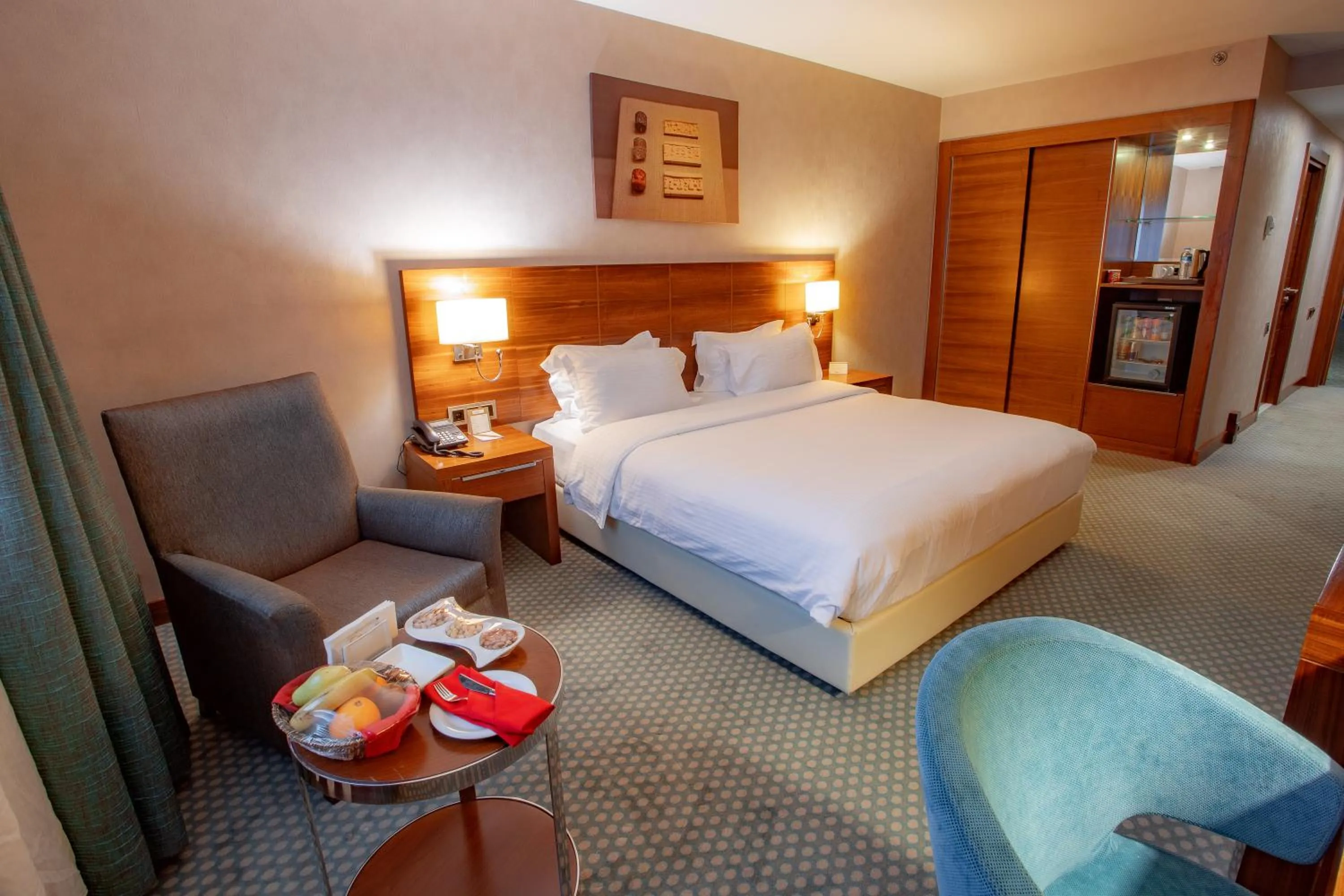 Bed in Nevali Hotel & Convention Center