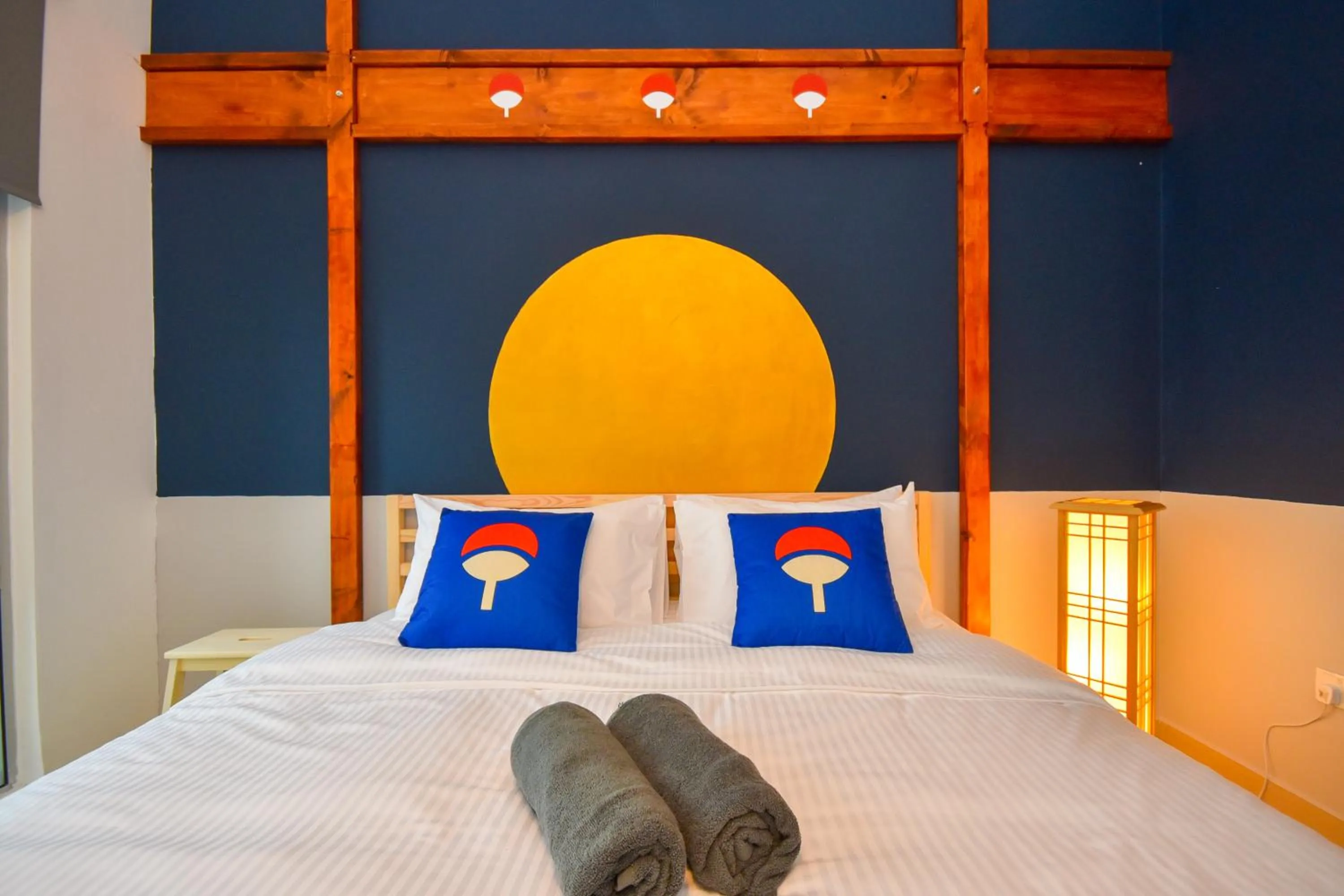 Bed in Manhattan Theme Suite by Nest Home at Austin Heights