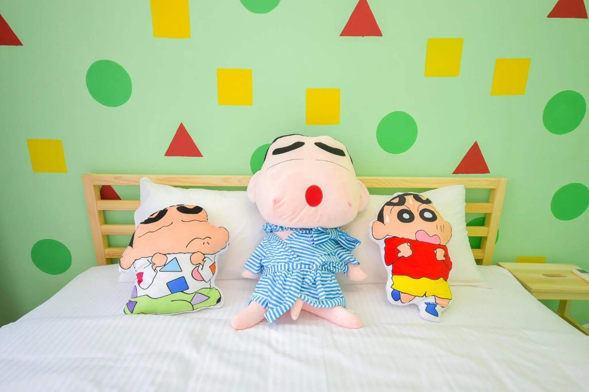 Bed in Manhattan Theme Suite by Nest Home at Austin Heights