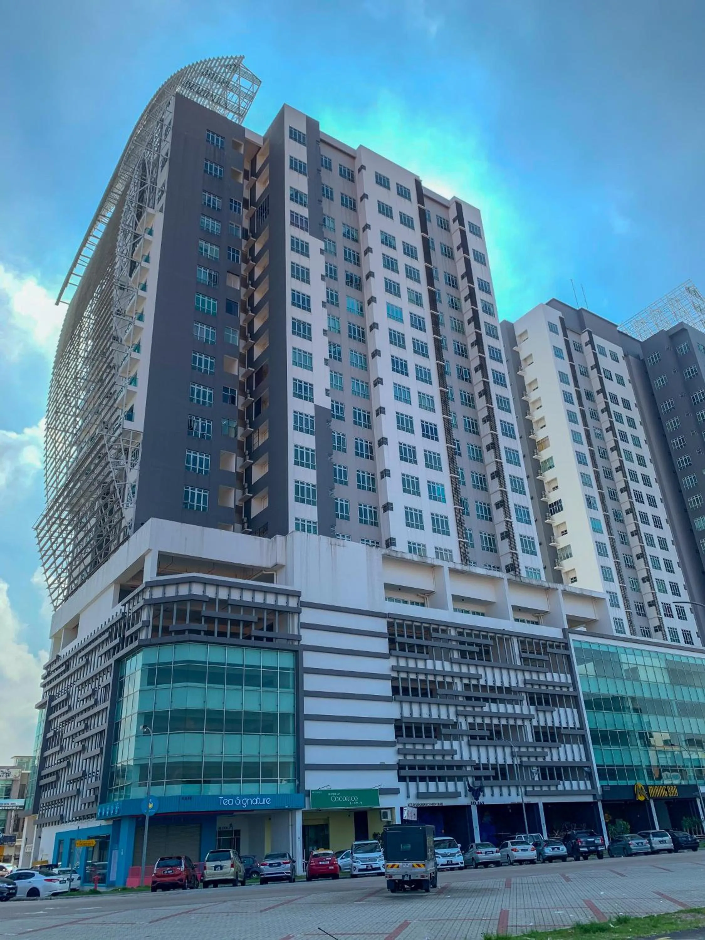 Property building in Manhattan Theme Suite by Nest Home at Austin Heights