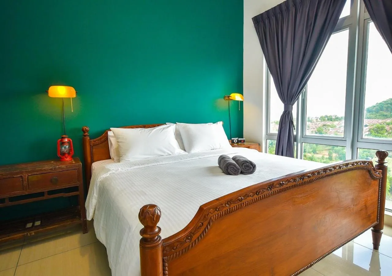 Bed in Manhattan Theme Suite by Nest Home at Austin Heights