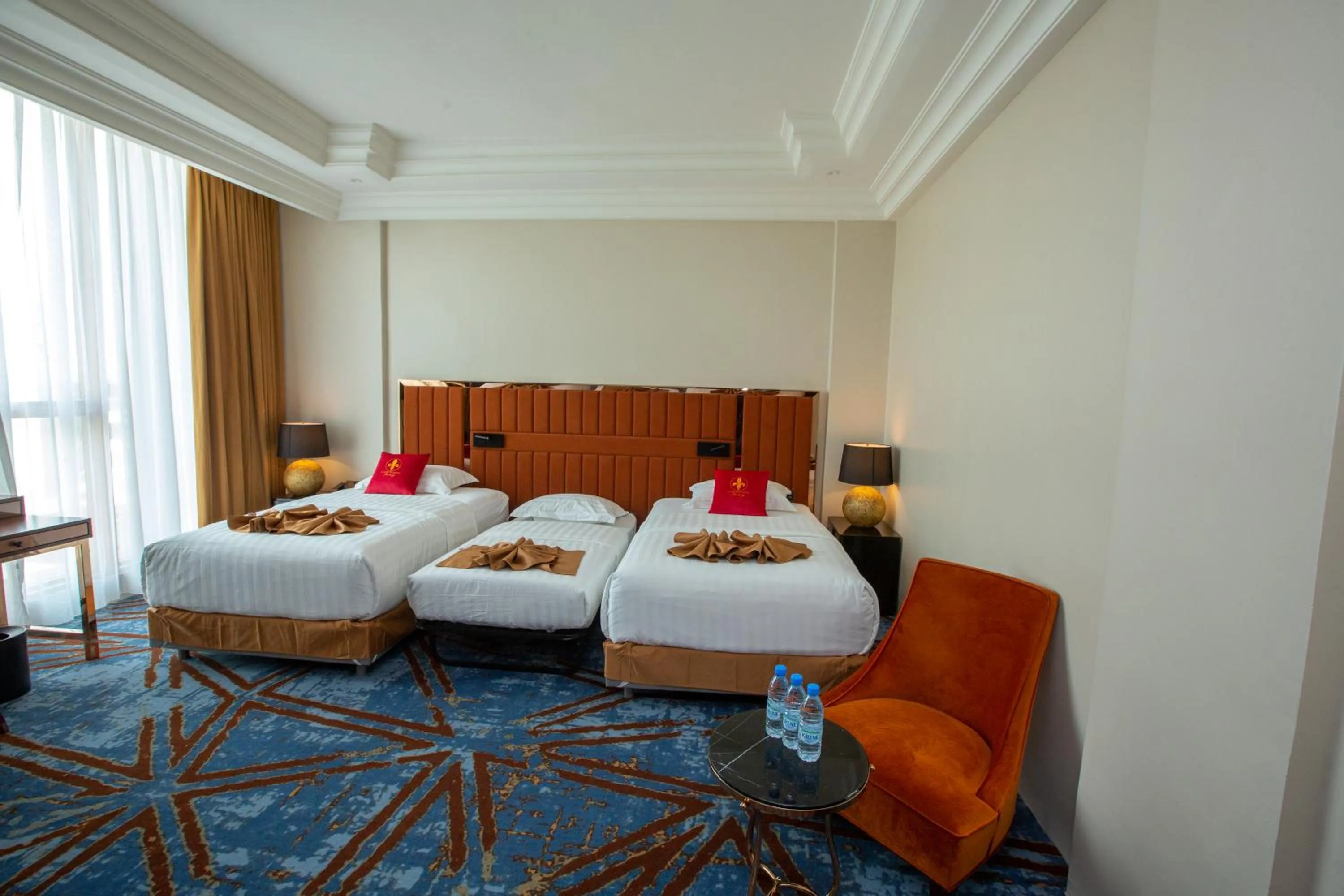 Bed in Hôtel Fleur de Lys Point E