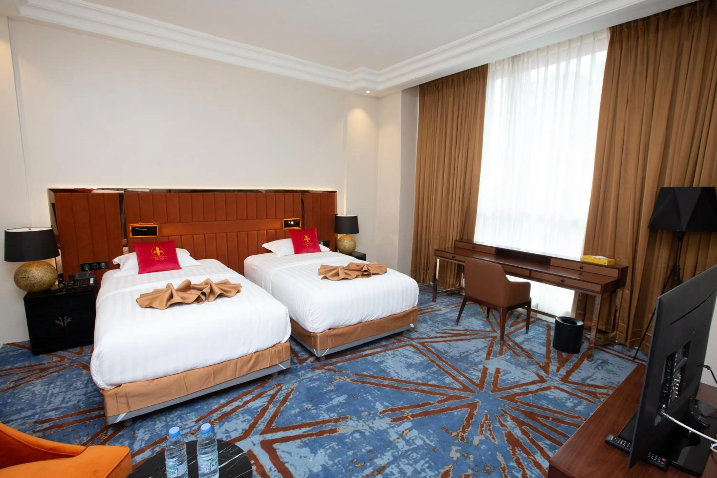 Bed in Hôtel Fleur de Lys Point E