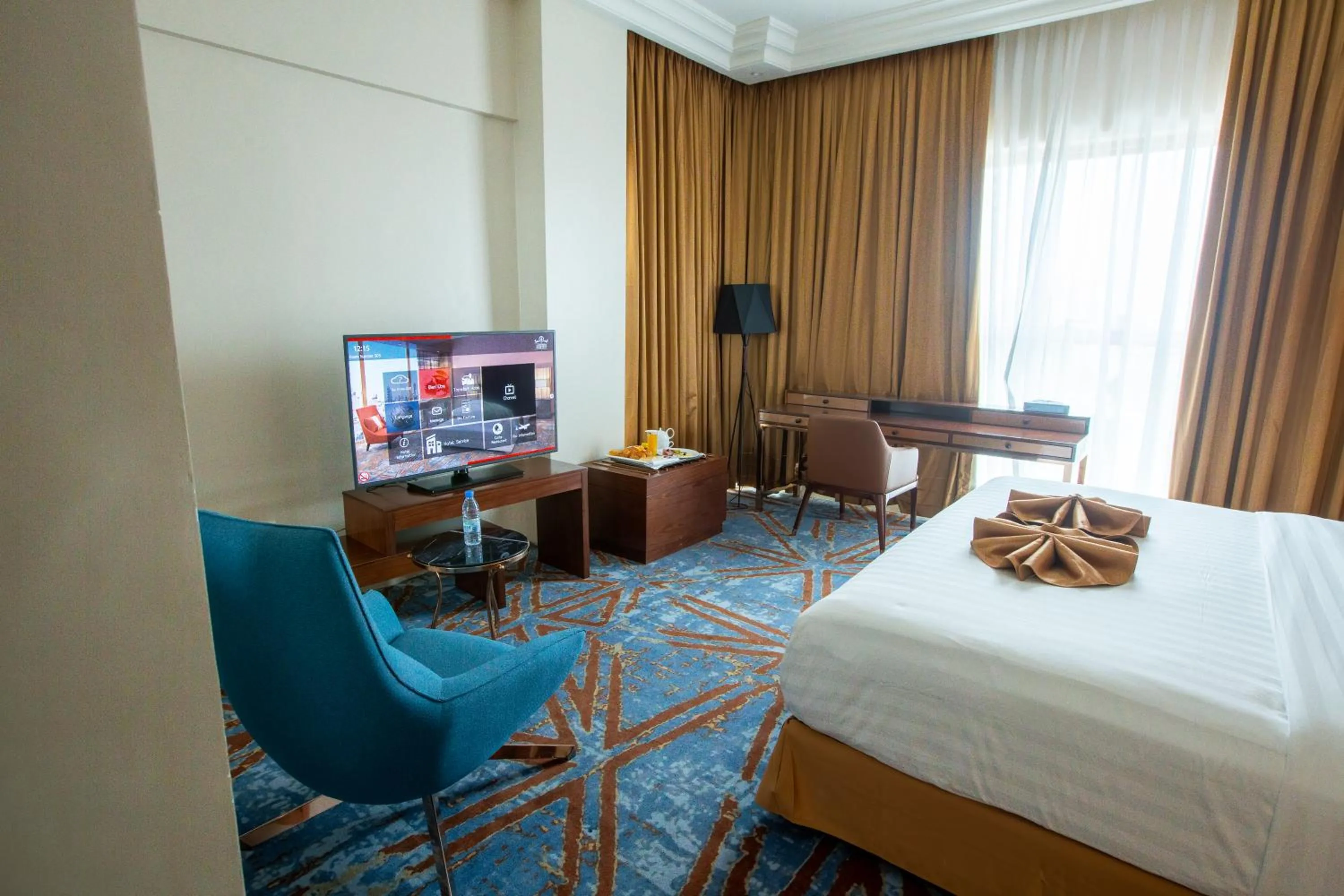 Bed in Hôtel Fleur de Lys Point E