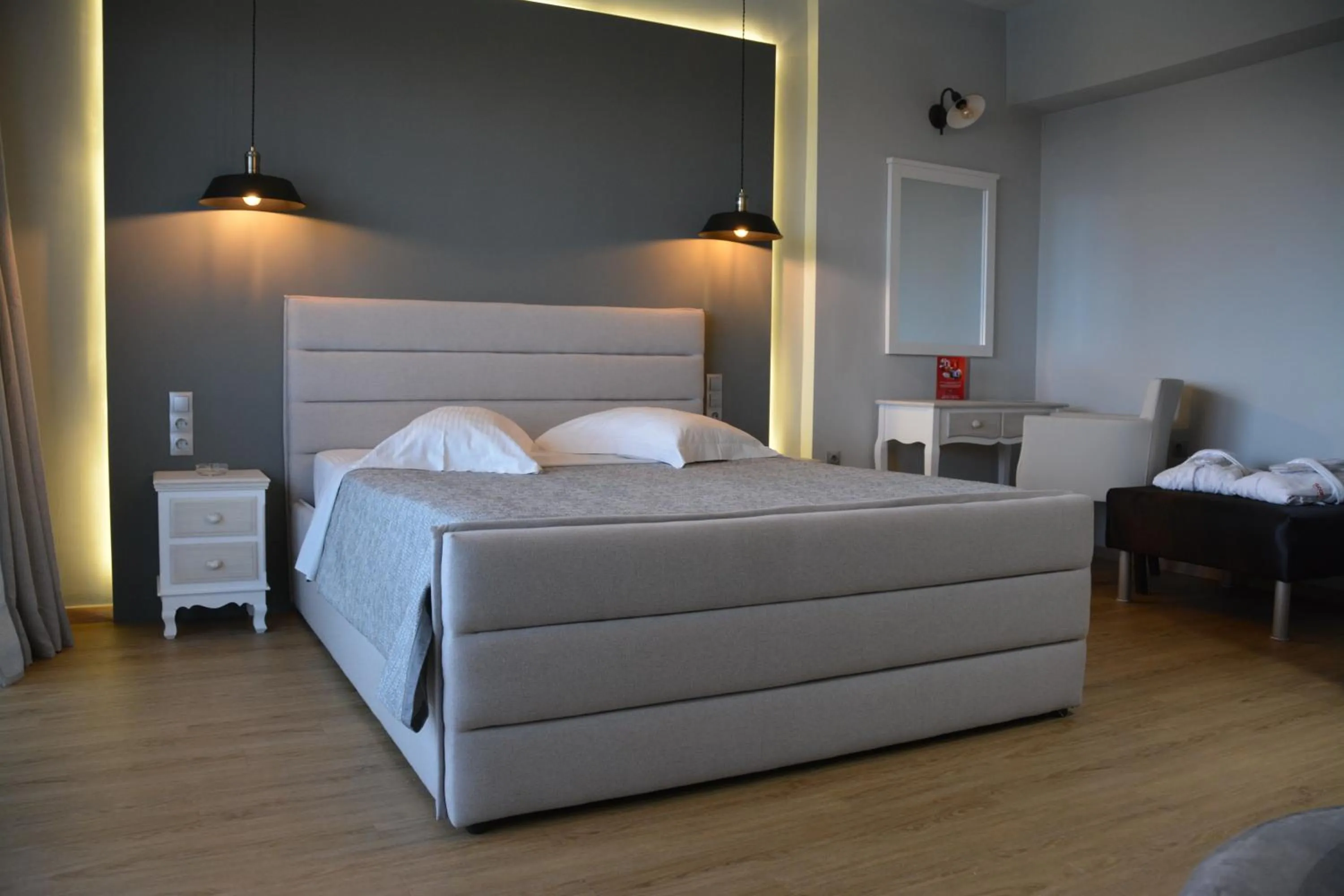 Bed in Scorpios Sea Side Hotel