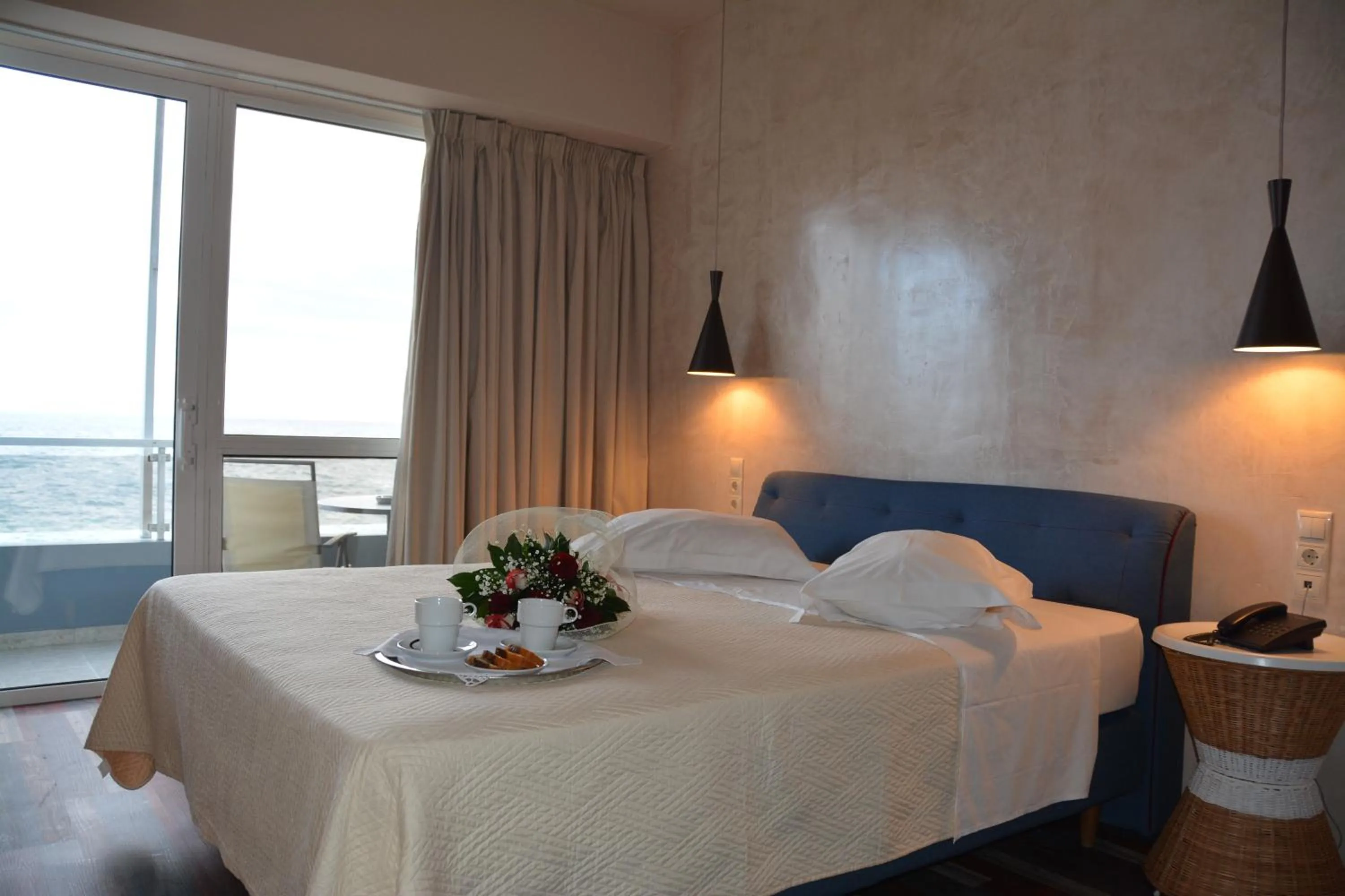 Bed in Scorpios Sea Side Hotel