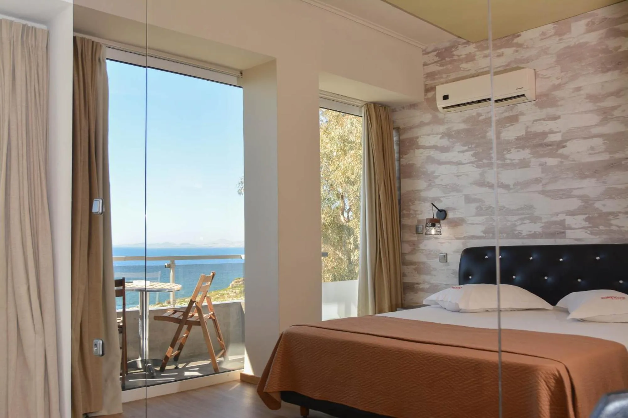 Bed in Scorpios Sea Side Hotel