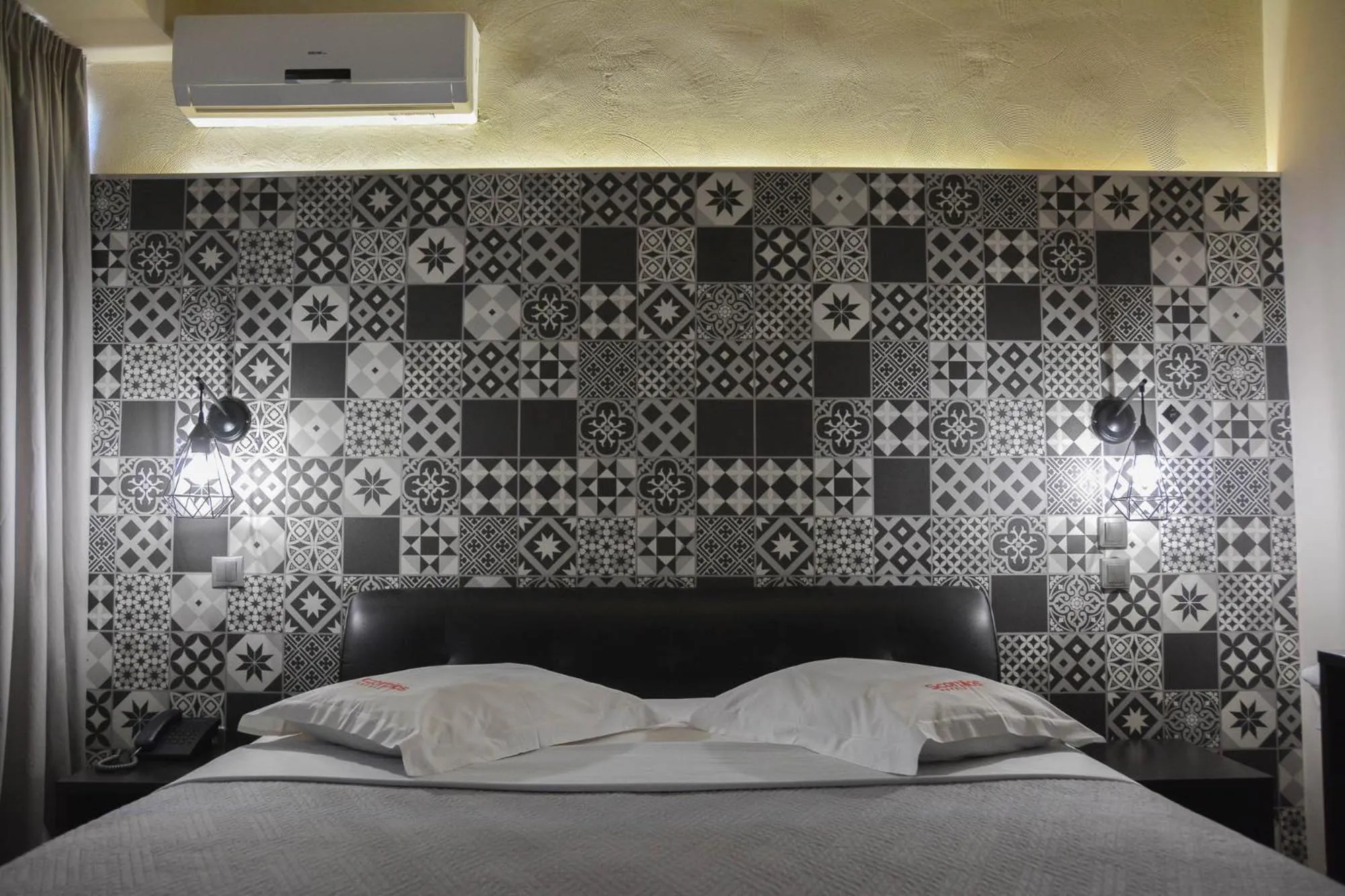 Bed in Scorpios Sea Side Hotel