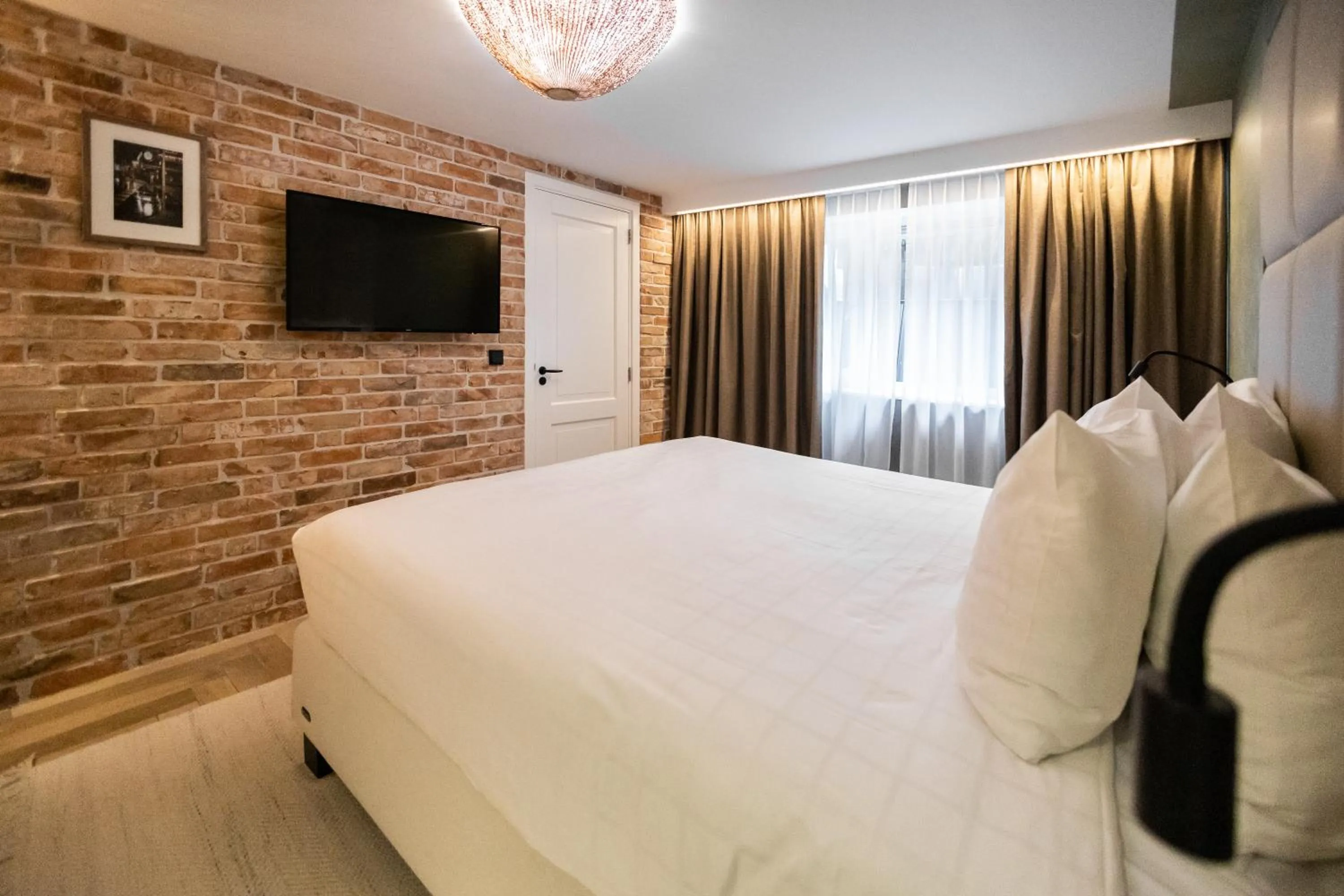 Bed in De Ware Jacob Boutique Hotel