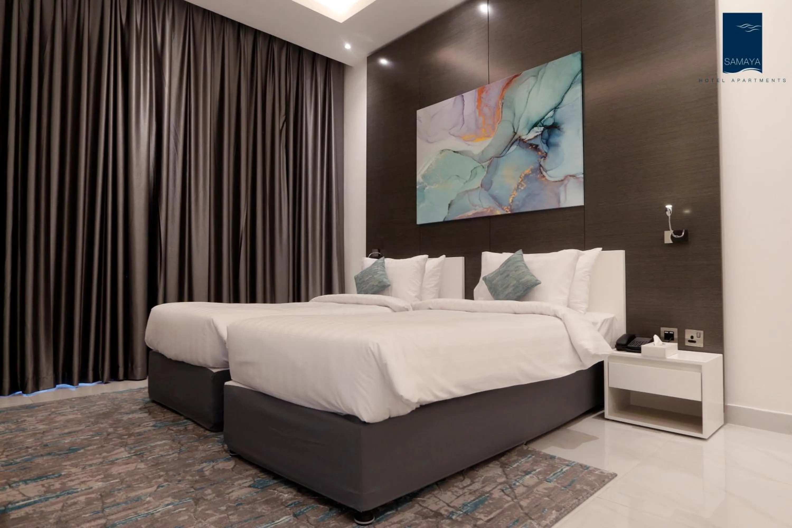 Bed in Samaya Hotel Apartment Dubai