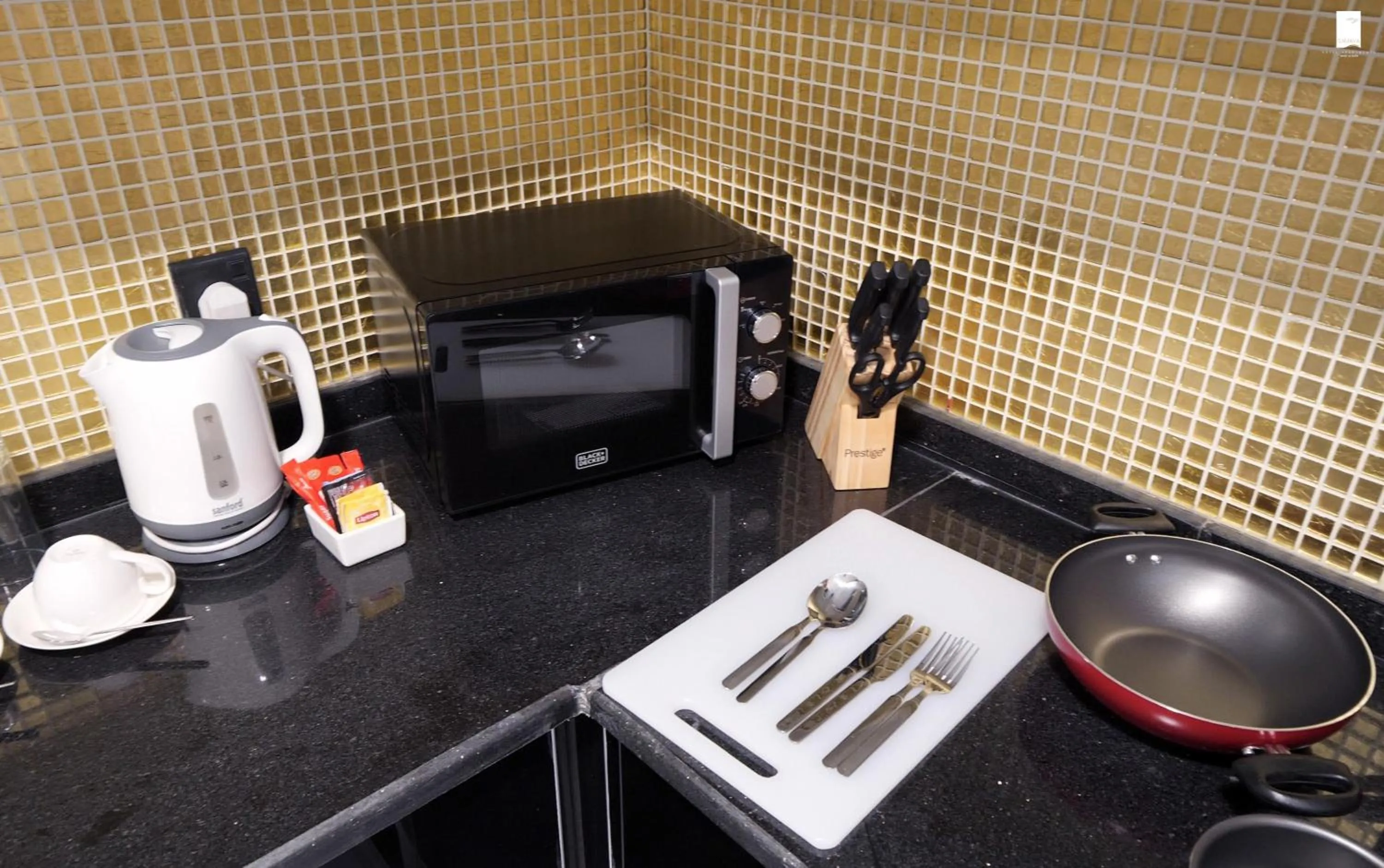 Kitchen or kitchenette in Samaya Hotel Apartment Dubai