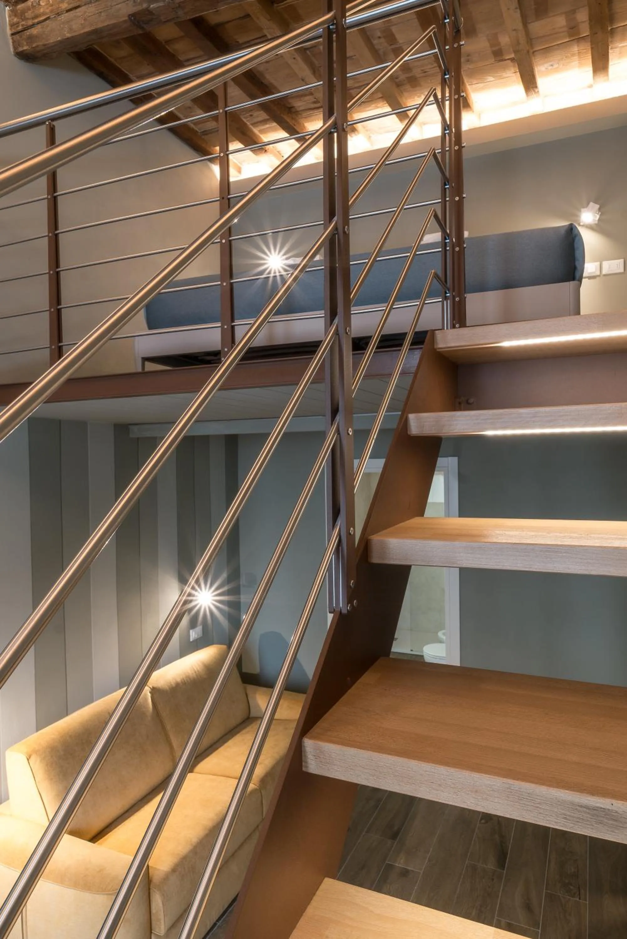 Bed in GOGO` Petit Hotel