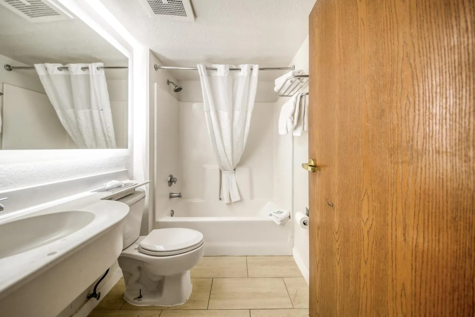 Shower in Baymont by Wyndham Orlando-International Dr-Universal Blvd