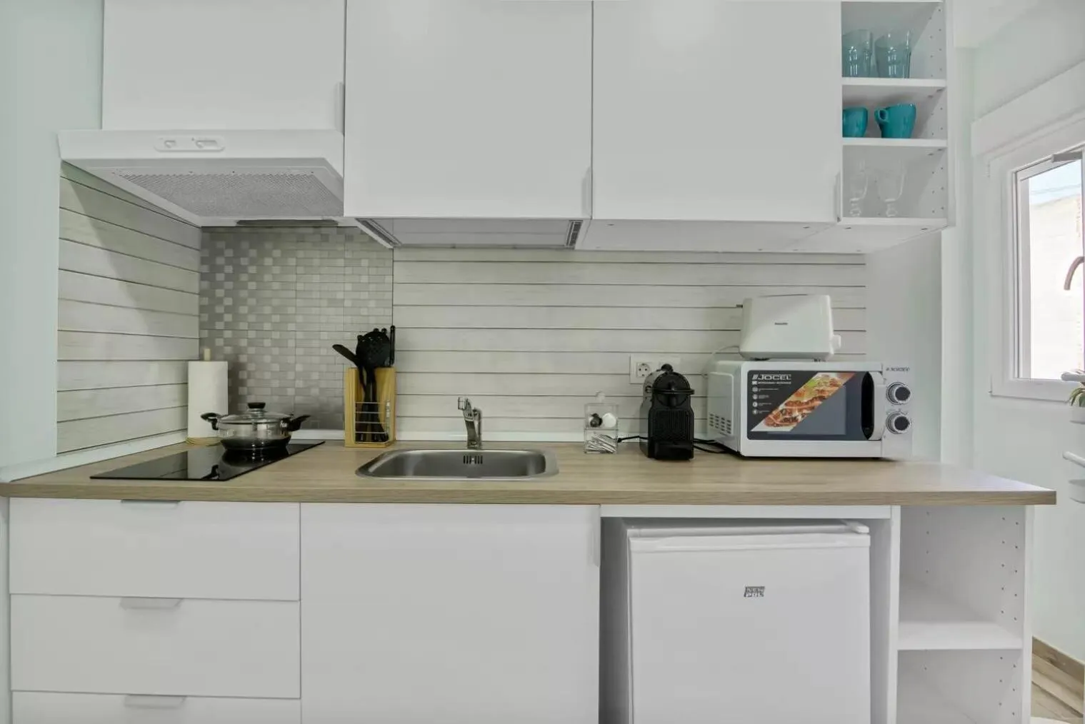 Kitchen or kitchenette in Umihouse apartamentos centro Alicante