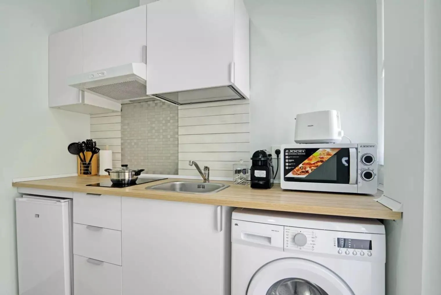 Kitchen or kitchenette in Umihouse apartamentos centro Alicante