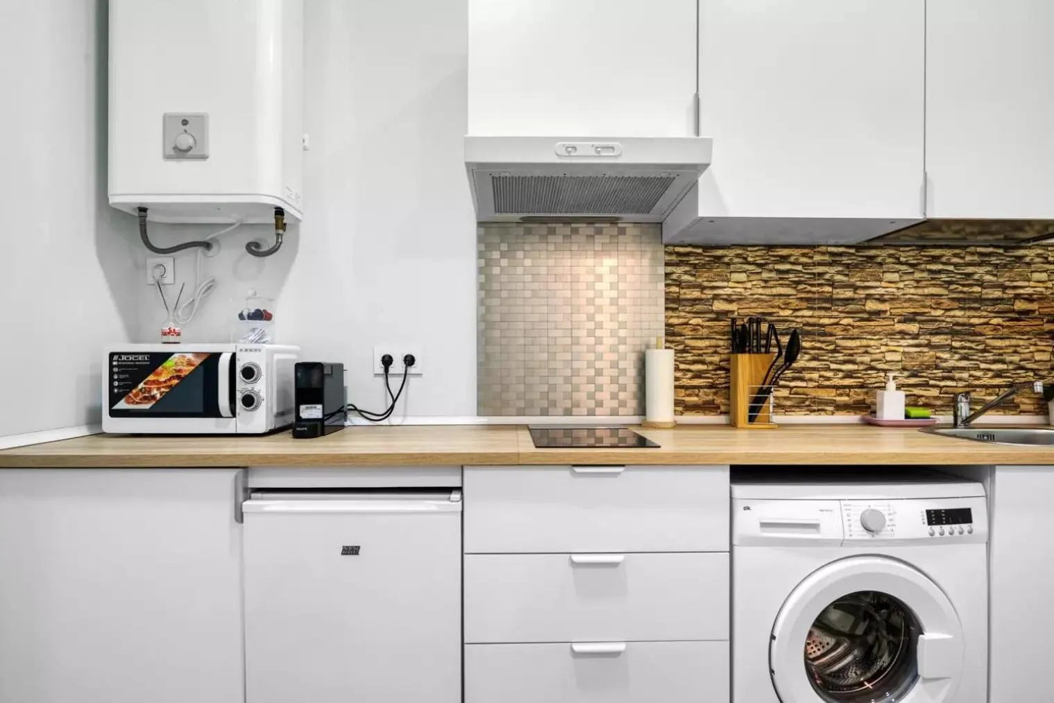 Kitchen or kitchenette in Umihouse apartamentos centro Alicante