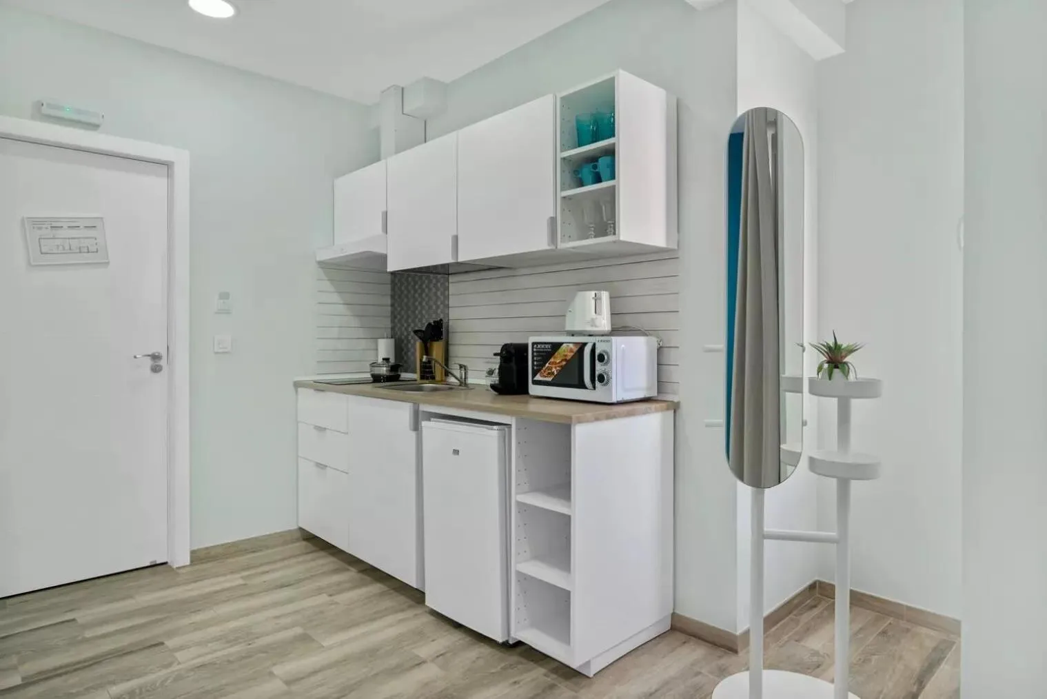 Kitchen or kitchenette in Umihouse apartamentos centro Alicante