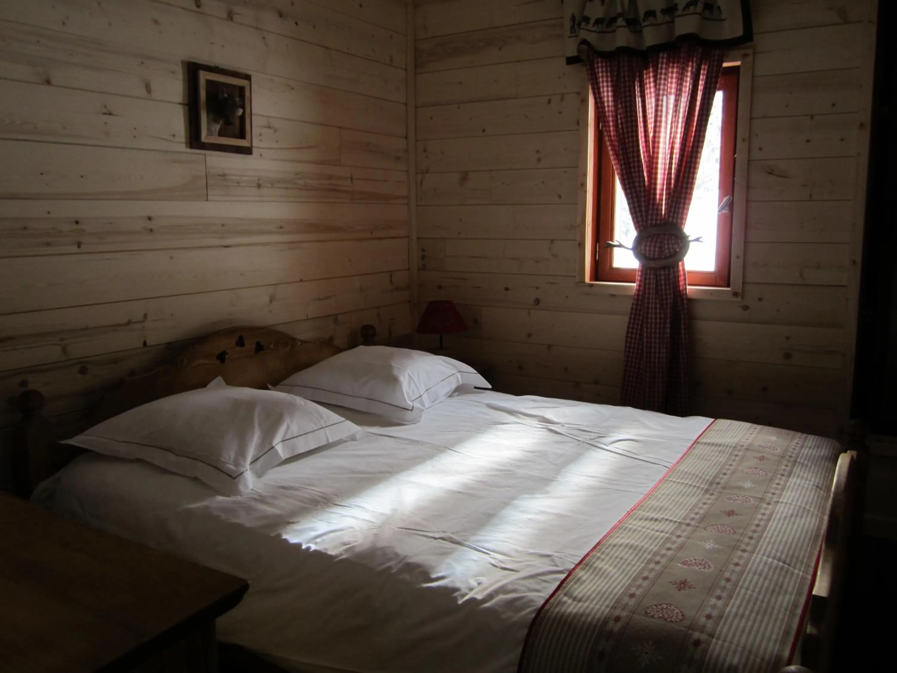 Bed in Hôtel Chalet Le Caribou