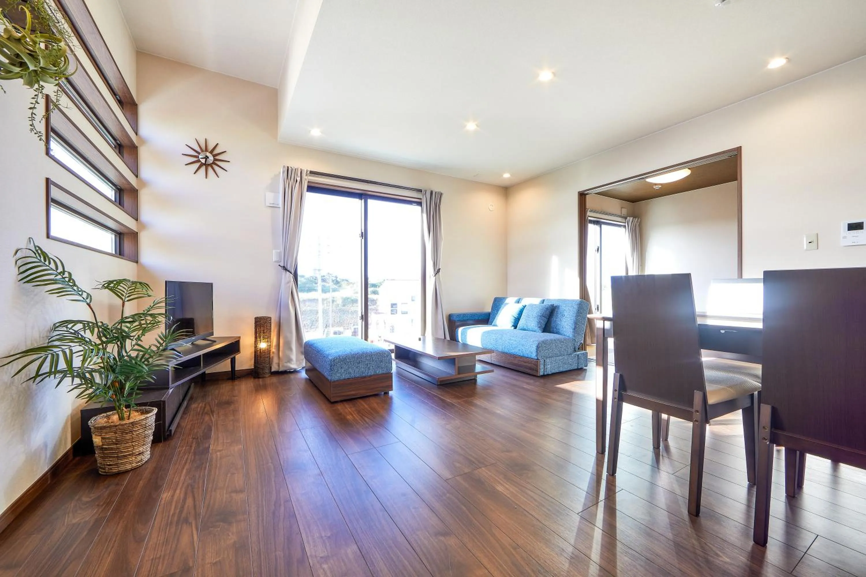 Living room in E-horizon Resort コンドミニアム名護B