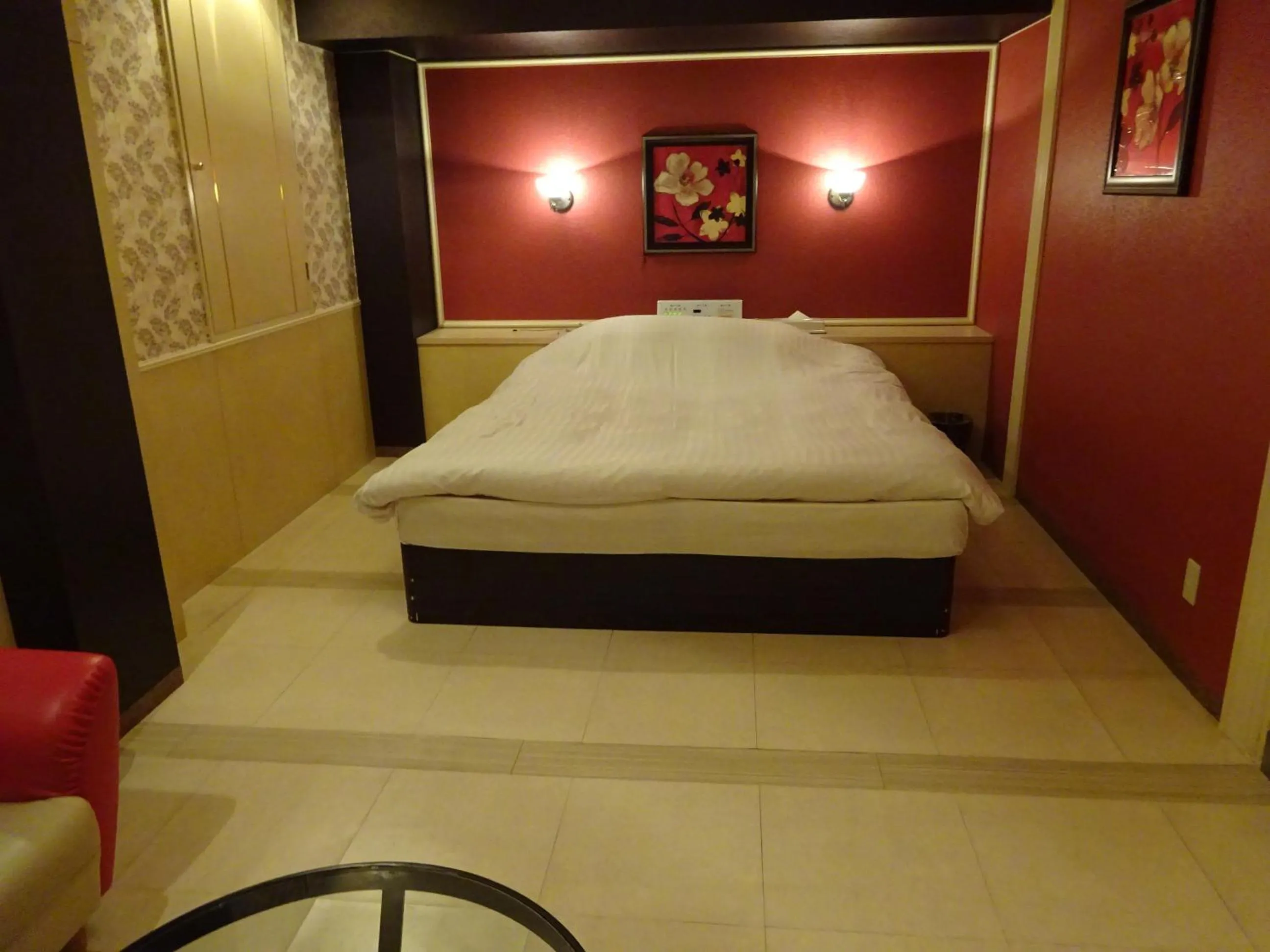 Bed in HOTEL Rplus Higashimatsuyama