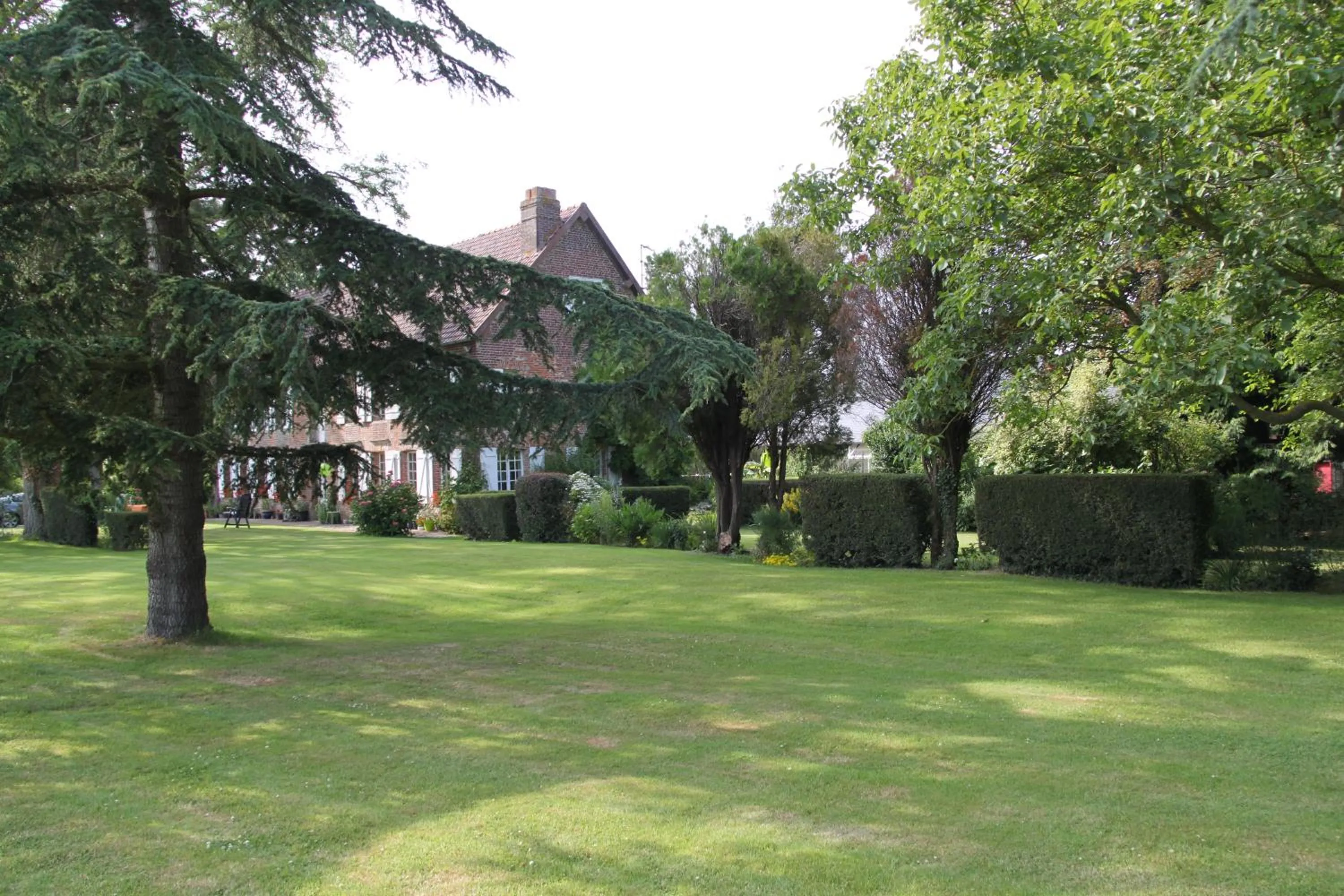 Garden view in Chambres d'hôtes Manoir du Buquet