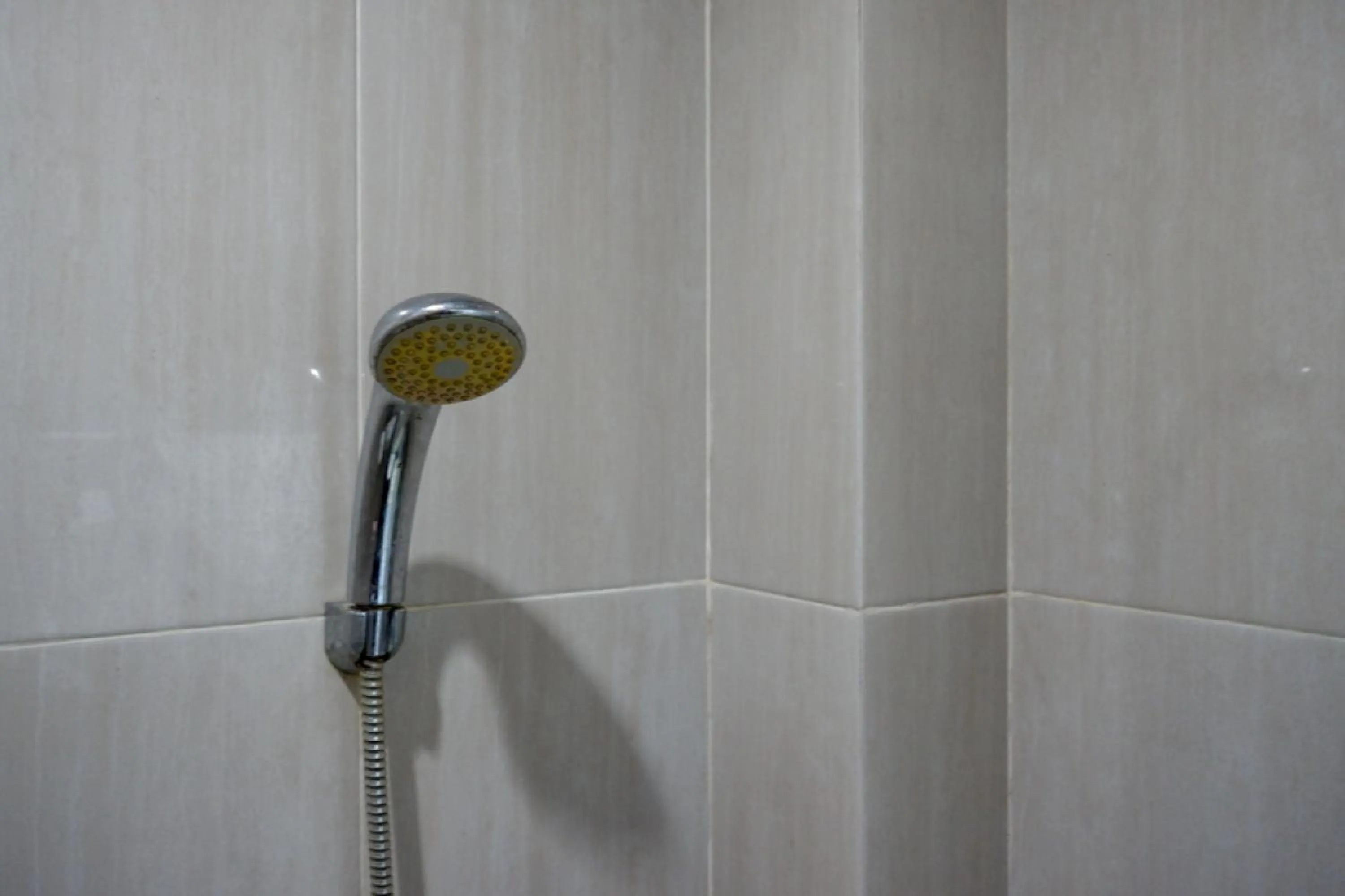 Bathroom in RedDoorz @ Hotel Bravo Pantai Kamali Bau Bau