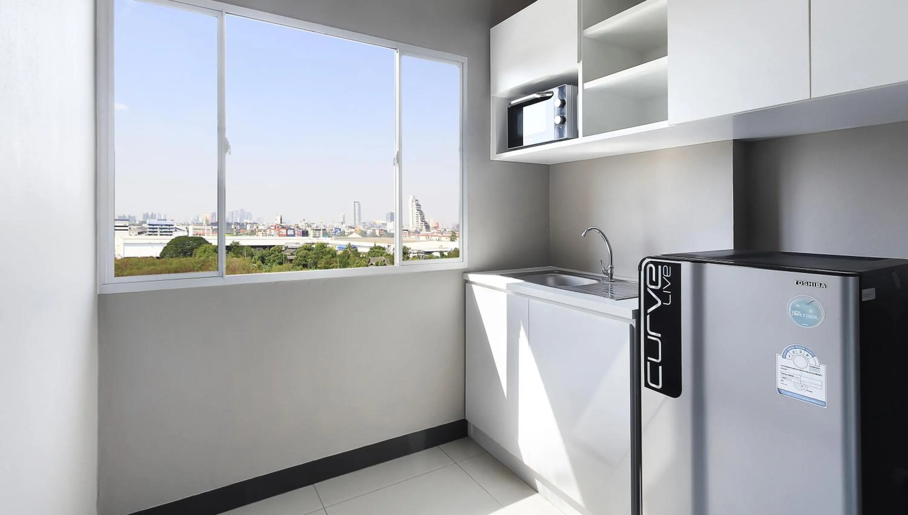 Kitchen or kitchenette in Fullroom 77 Srinakarin